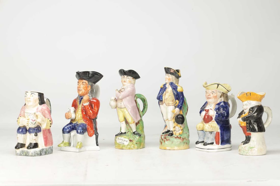 A COLLECTION OF 18TH AND 19TH CENTURY ENGLISH STAFFORDSHIRE POTTERY TOBY JUGS - 2
