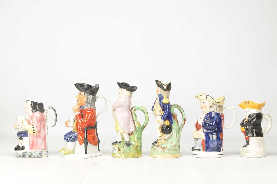 A COLLECTION OF 18TH AND 19TH CENTURY ENGLISH STAFFORDSHIRE POTTERY TOBY JUGS - 7