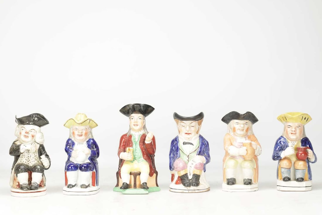 A COLLECTION OF 18TH AND 19TH CENTURY ENGLISH POTTERY TOBY JUGS - 2
