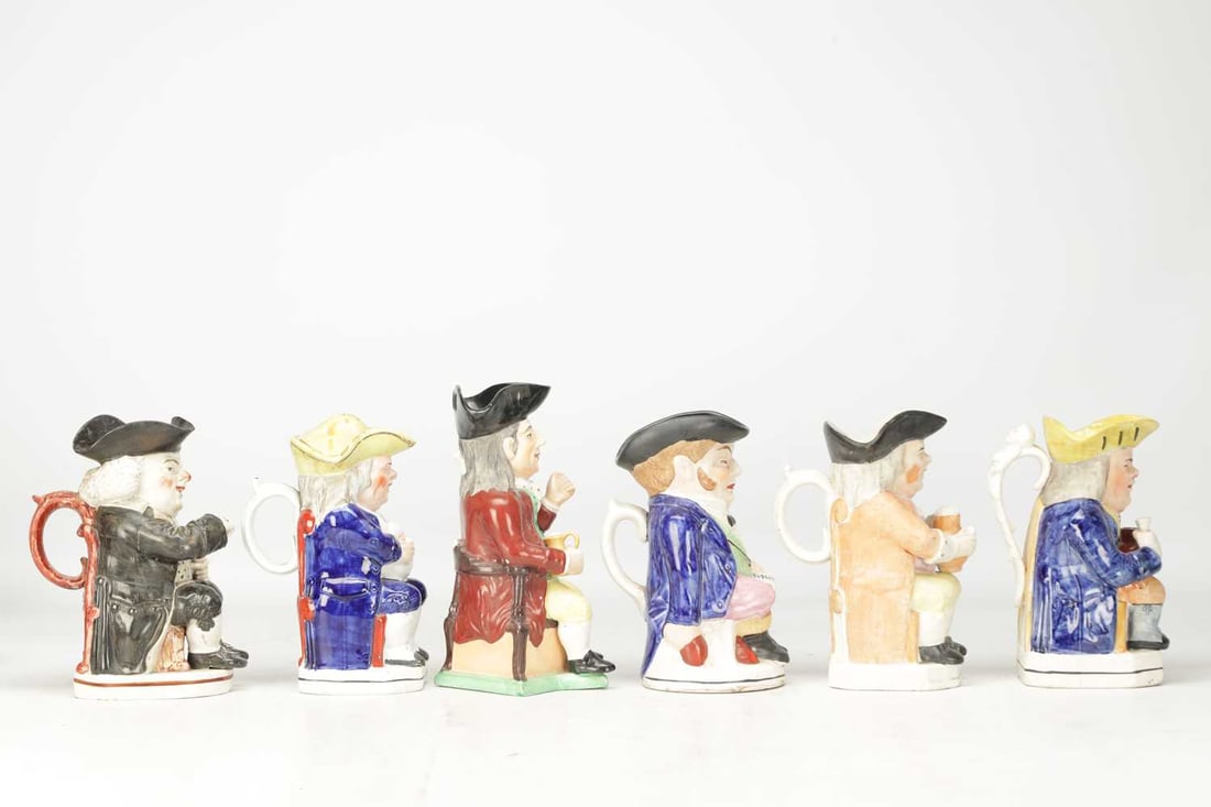 A COLLECTION OF 18TH AND 19TH CENTURY ENGLISH POTTERY TOBY JUGS - 7