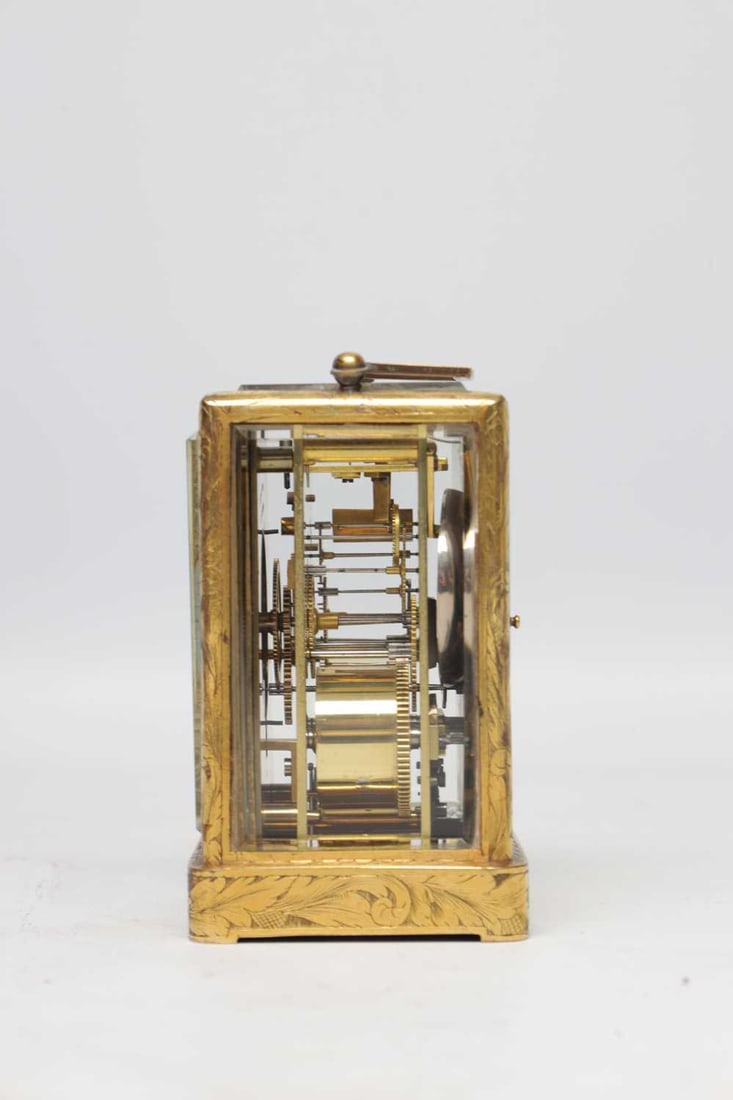 A 19TH CENTURY FRENCH ENGRAVED GILT-BRASS ONE-PIECE CASE STRIKING CARRIAGE CLOCK - 4