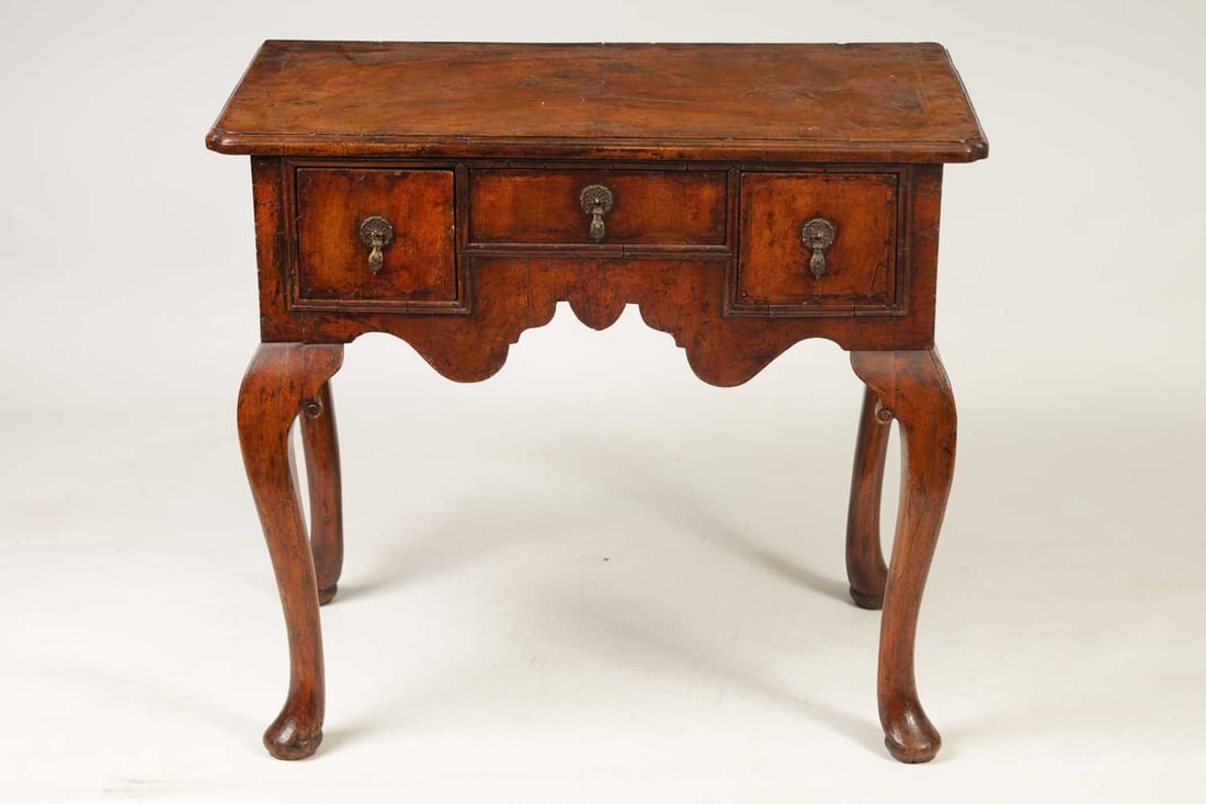 A GEORGE I FIGURED WALNUT AND HERRING-BANDED LOWBOY - 2
