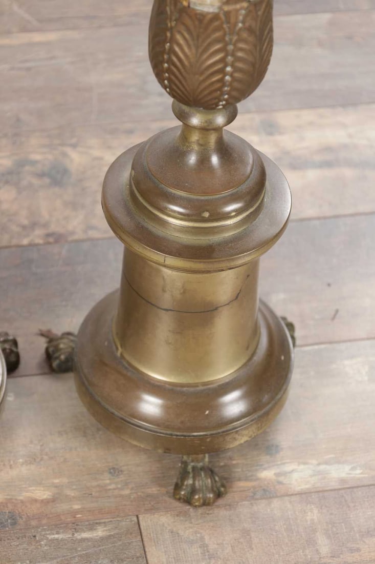 A PAIR OF LARGE BRASS CANDLESTICKS ON PAW FEET - 6