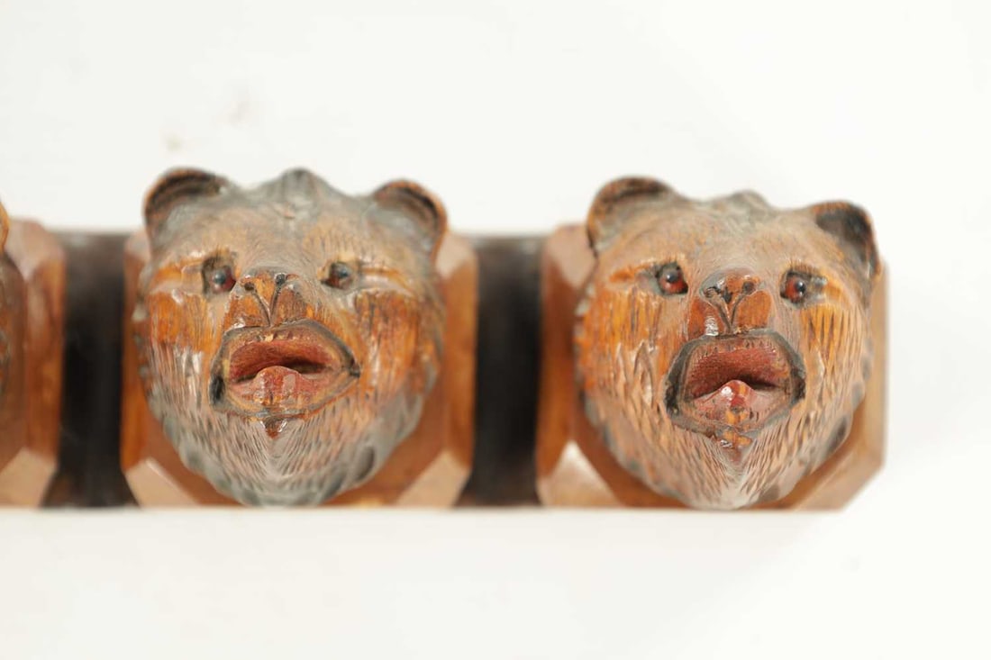 A 19TH CENTURY BLACK FOREST BEAR PIPE RACK - 2