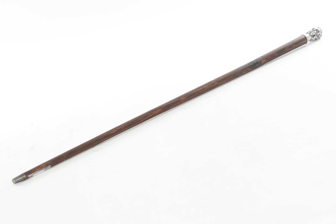 A 19TH CENTURY MALACCA WALKING CANE WITH SILVER JANUS HANDLE - 2