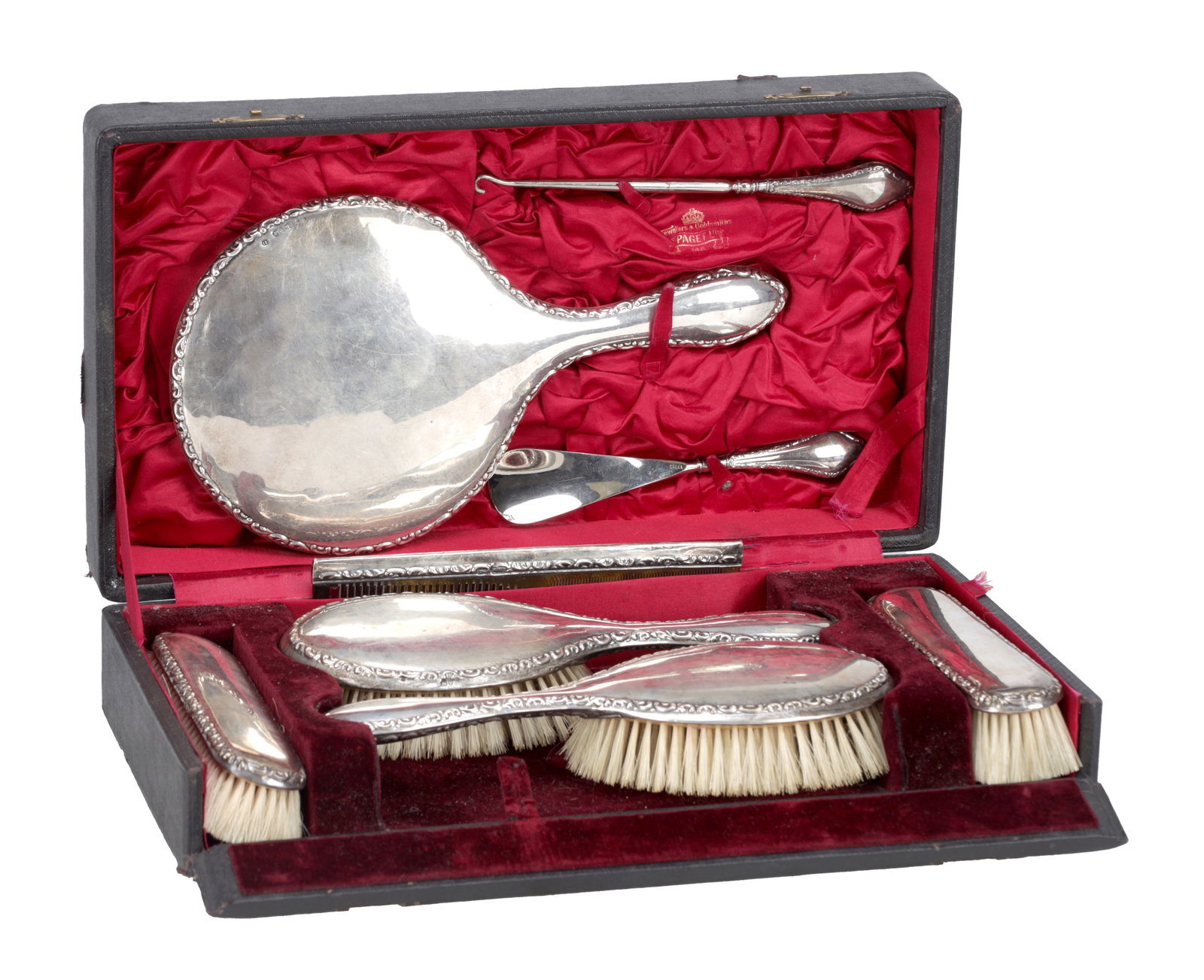 A VICTORIAN SILVER DRESSING TABLE SET IN FITTED CASE (1 of 8)