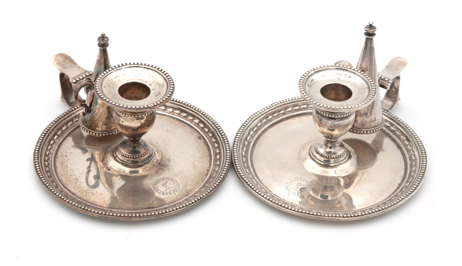 A PAIR OF VICTORIAN ENGLISH SILVER CHAMBERSTICKS WITH CONICAL SNUFFERS (1 of 11)