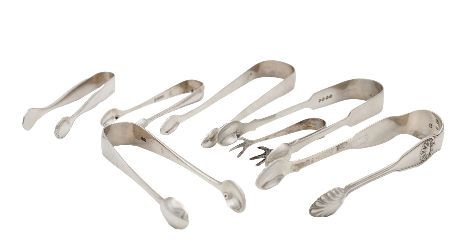 A COLLECTION OF 19TH CENTURY ENGLISH AND SCOTTISH SILVER SUGAR TONGS: A COLLECTION OF 19TH CENTURY ENGLISH AND SCOTTISH SILVER SUGAR TONGS comprising varied patterns including bright-cut decoration, shell bowls and claw-end grips, all hallmarked; total app. weight