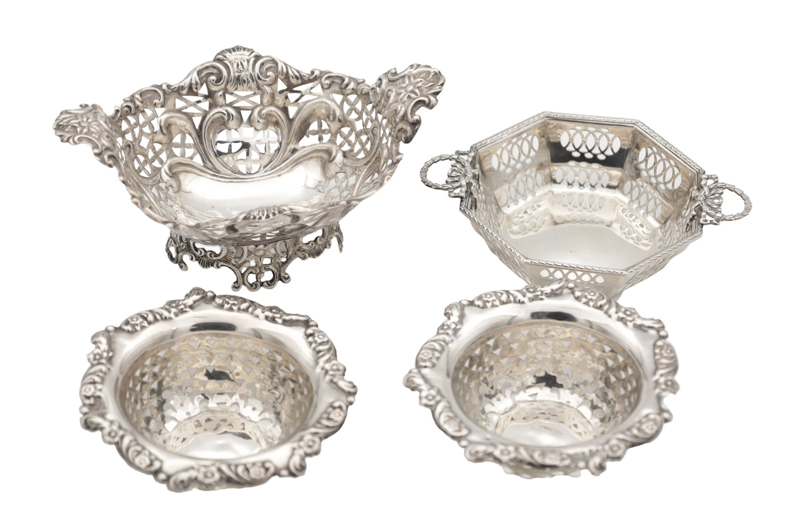 A COLLECTION OF EARLY 20TH CENTURY ENGLISH SILVER BON BON DISHES: A COLLECTION OF EARLY 20TH CENTURY ENGLISH SILVER BON BON DISHES comprising a pair hallmarked Sheffield 1903, a dish with side handles hallmarked Birmingham 1912, and a pedestal dish unmarked, total