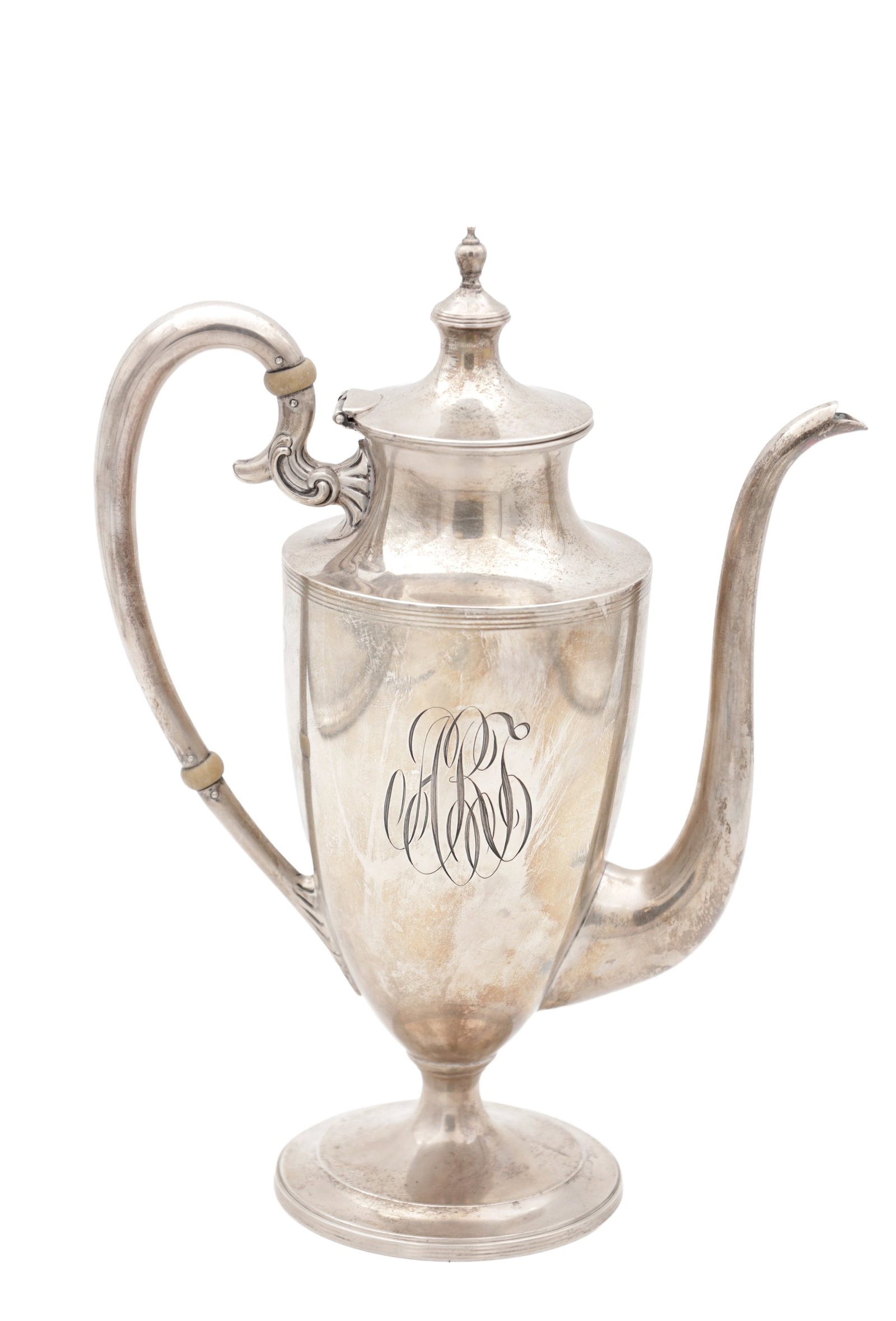 A 19TH CENTURY STERLING SILVER COFFEE POT: A 19TH CENTURY STERLING SILVER COFFEE POT of tapered baluster form with a hinged domed cover and urn finial, engraved monogram to the body, with a scroll-mounted loop handle and slender curved spout,