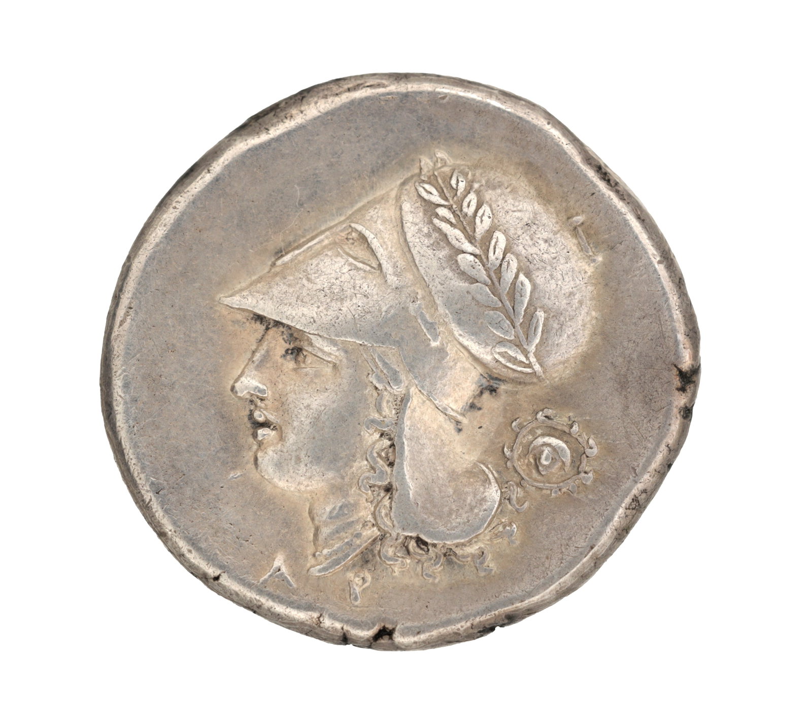 A 350-285 BC GREEK CORINTHIA SILVER STATER: A 350-285 BC GREEK CORINTHIA SILVER STATER with the head of Athena left wearing a crested Corinthian helmet with laurel wreath, app. 8.5g. (approx 8.5 g)