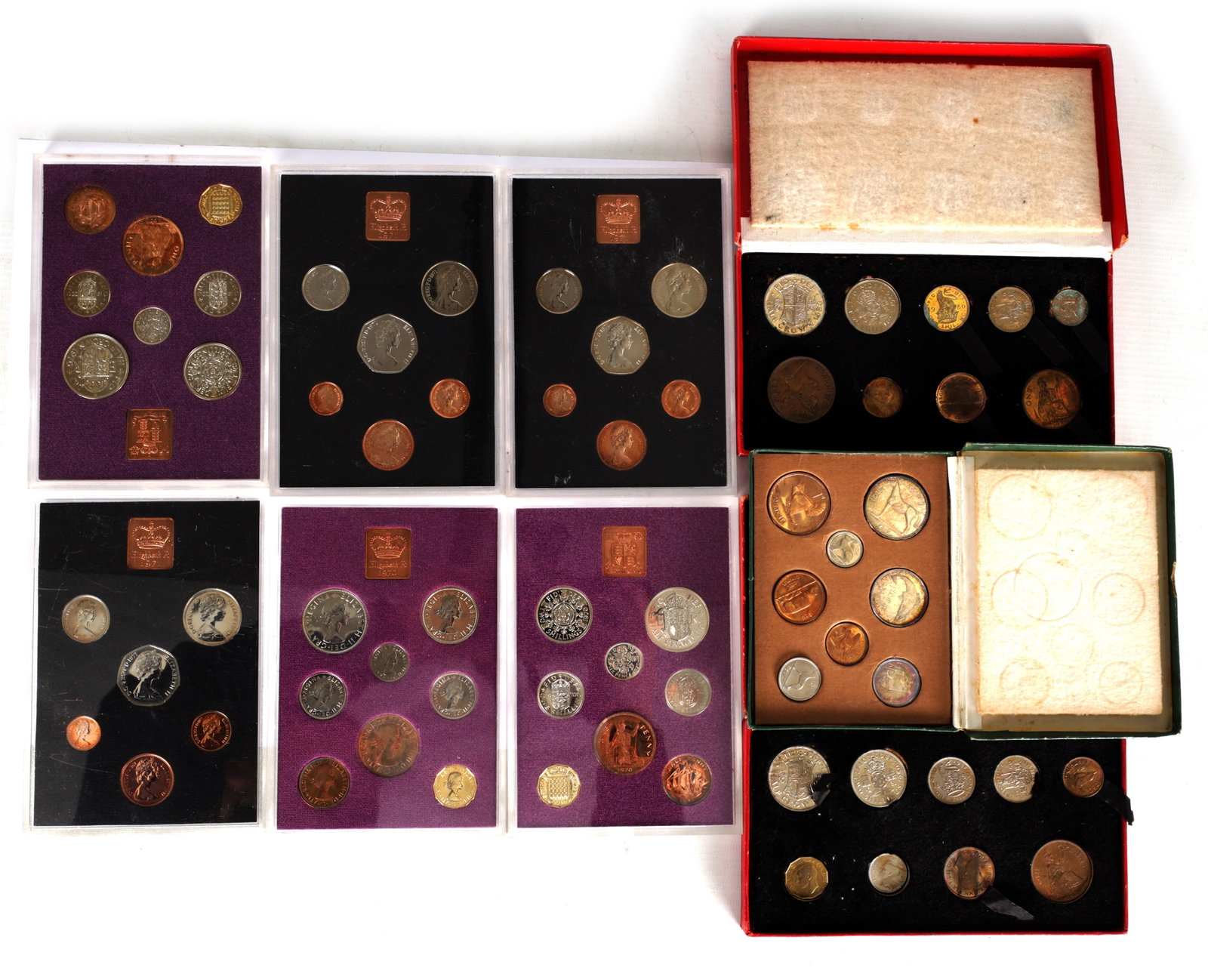 A COLLECTION OF NINE ROYAL MINT PROOF COIN SETS: A COLLECTION OF NINE ROYAL MINT PROOF COIN SETS comprising three 1971 Royal Mint Decimal Proof Coin Sets, three 1970 United Kingdom pre-decimal Proof Sets, two 1950 British Proof Coin Sets, and anothe