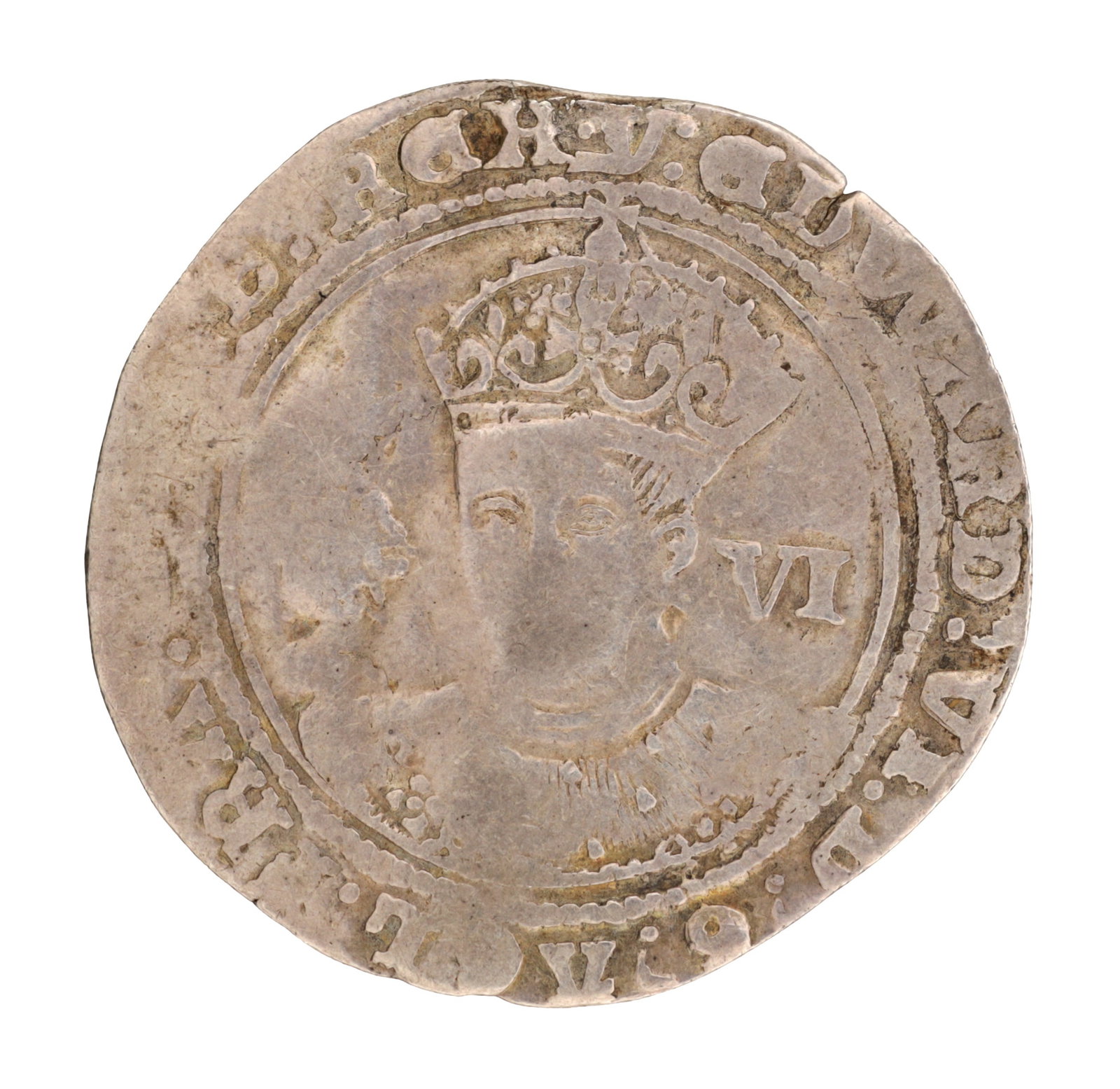 A MID 16TH CENTURY ENGLISH SILVER SIXPENCE OF EDWARD VI: A MID 16TH CENTURY ENGLISH SILVER SIXPENCE OF EDWARD VI of hammered issue with the obverse showing a crowned bust with VI to the right within a beaded inner circle and surrounding legend.