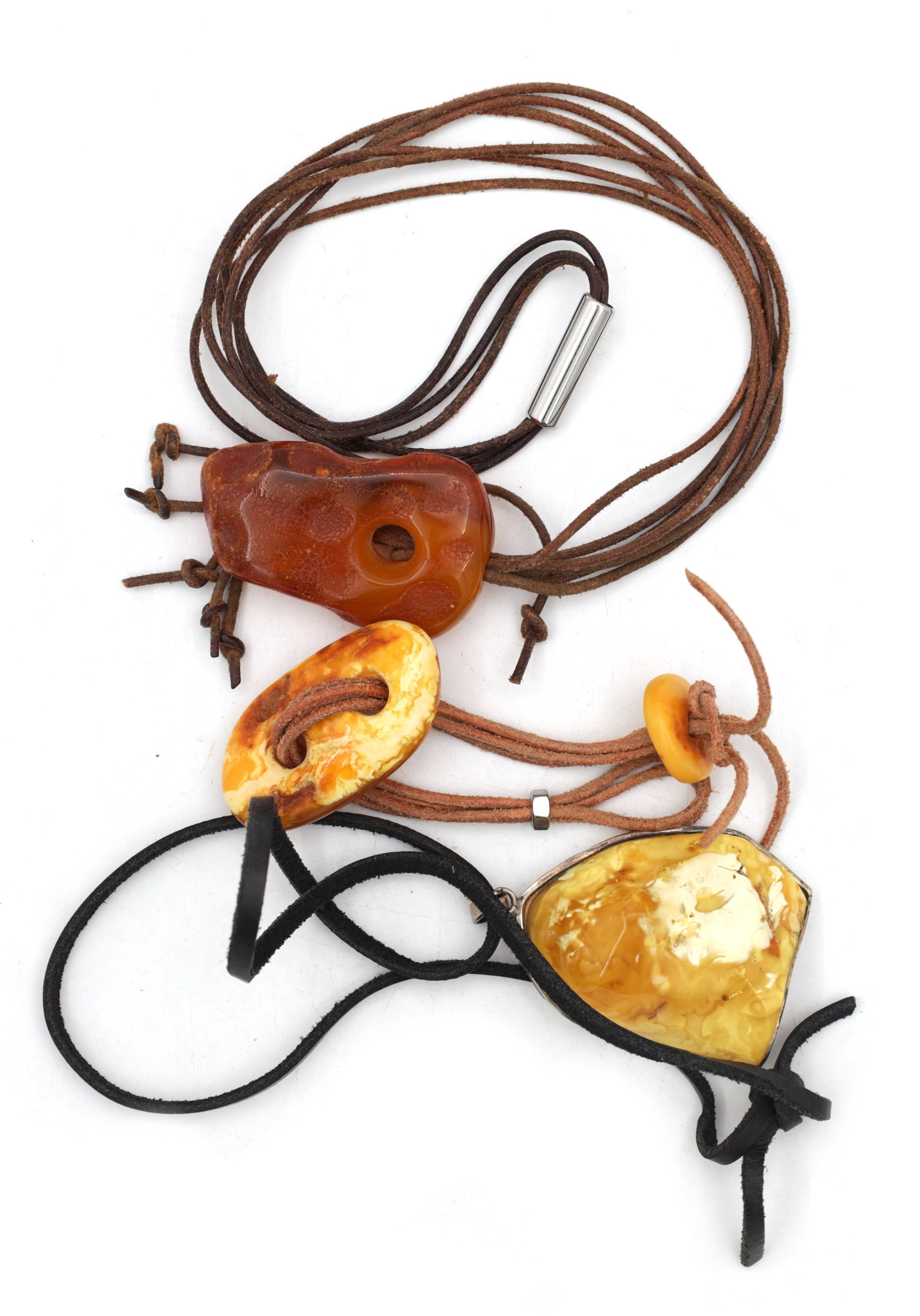 A COLLECTION OF THREE AMBER NECKLACES (1 of 7)
