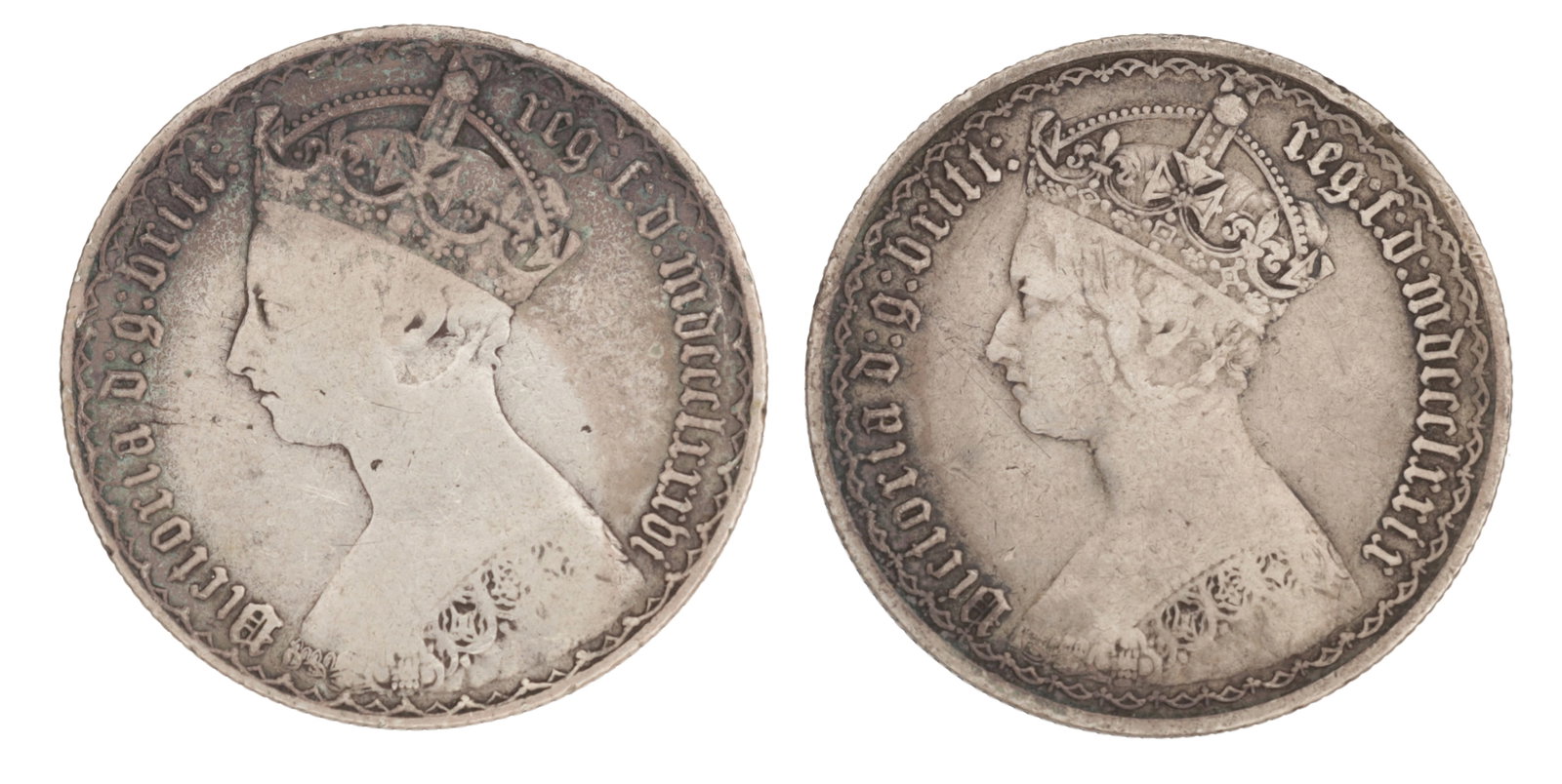 TWO VICTORIAN ENGLISH SILVER GOTHIC FLORINS: TWO VICTORIAN ENGLISH SILVER GOTHIC FLORINS each with the crowned left-facing bust of Queen Victoria within a Gothic legend, the reverses with cruciform crowned shields around a central rose and legen