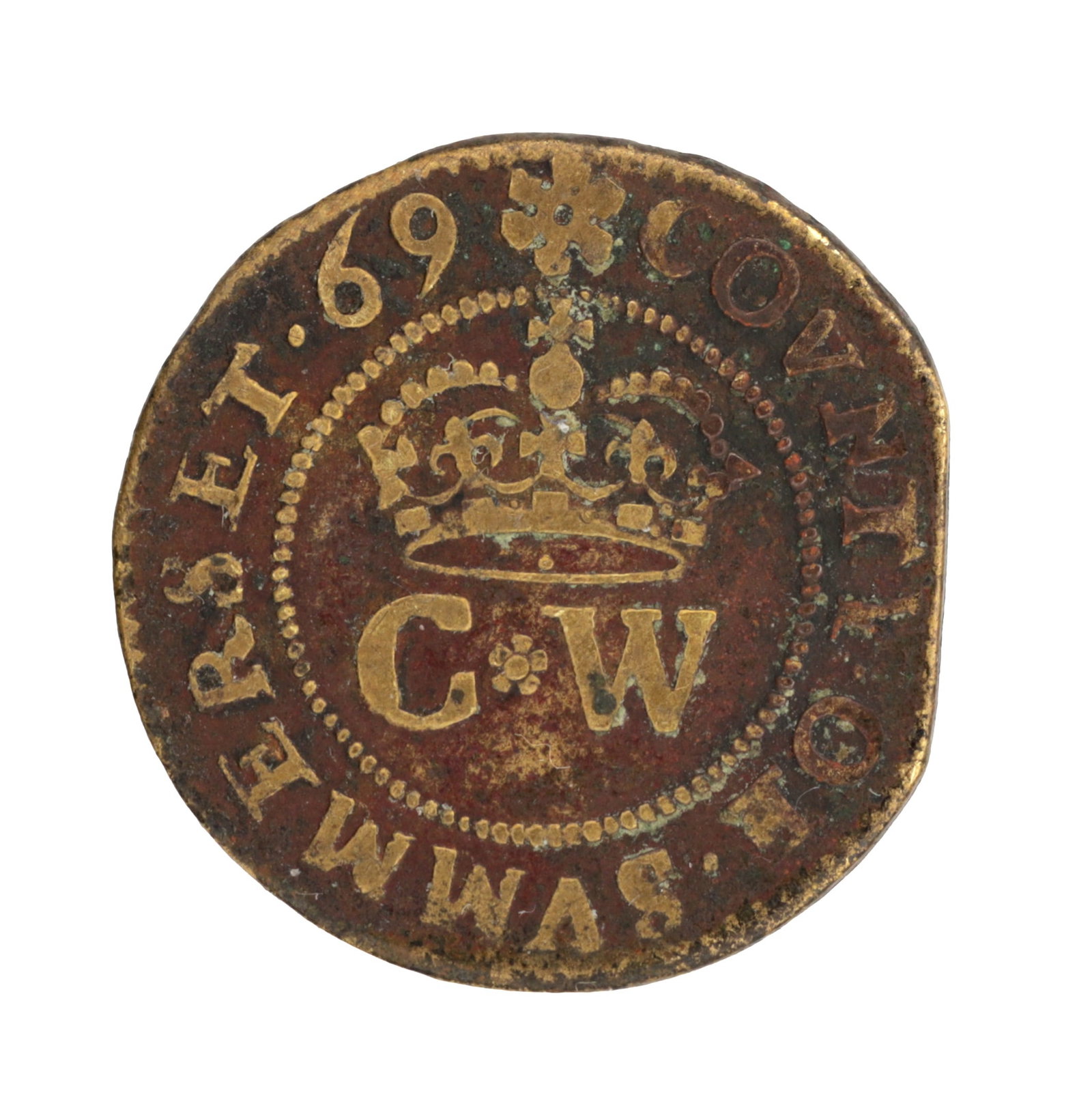 A 17TH CENTURY ENGLISH TRADE TOKEN: A 17TH CENTURY ENGLISH TRADE TOKEN struck for the City of Wells, Somerset with a crowned C W monogram within a beaded border and the legend COUNTY OF SOMERSET 69.