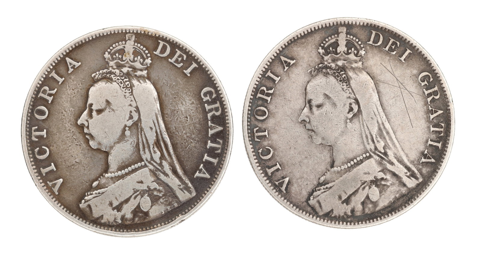 TWO 1889 AND 1890 ENGLISH SILVER QUEEN VICTORIA CROWNS: TWO 1889 AND 1890 ENGLISH SILVER QUEEN VICTORIA CROWNS with Jubilee Head obverse showing the crowned and veiled bust left inscribed VICTORIA DEI GRATIA. (35mm diameter (2))