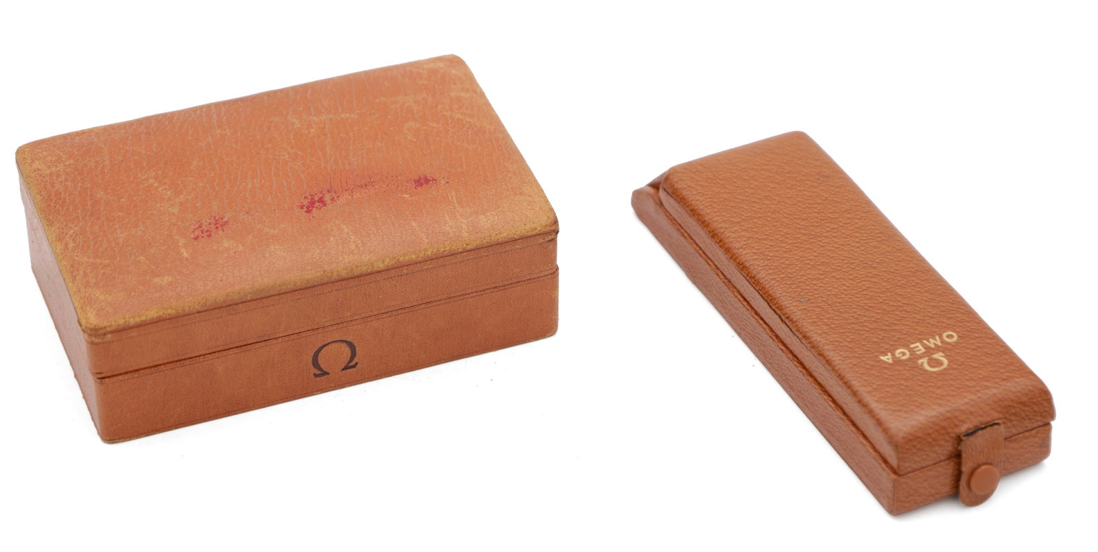 TWO VINTAGE OMEGA WRIST WATCH BOXES: TWO VINTAGE OMEGA WRIST WATCH BOXES comprising a rectangular hinged presentation case and a slim bracelet-style case with tab fastener, both in tan leatherette with Omega logos.
