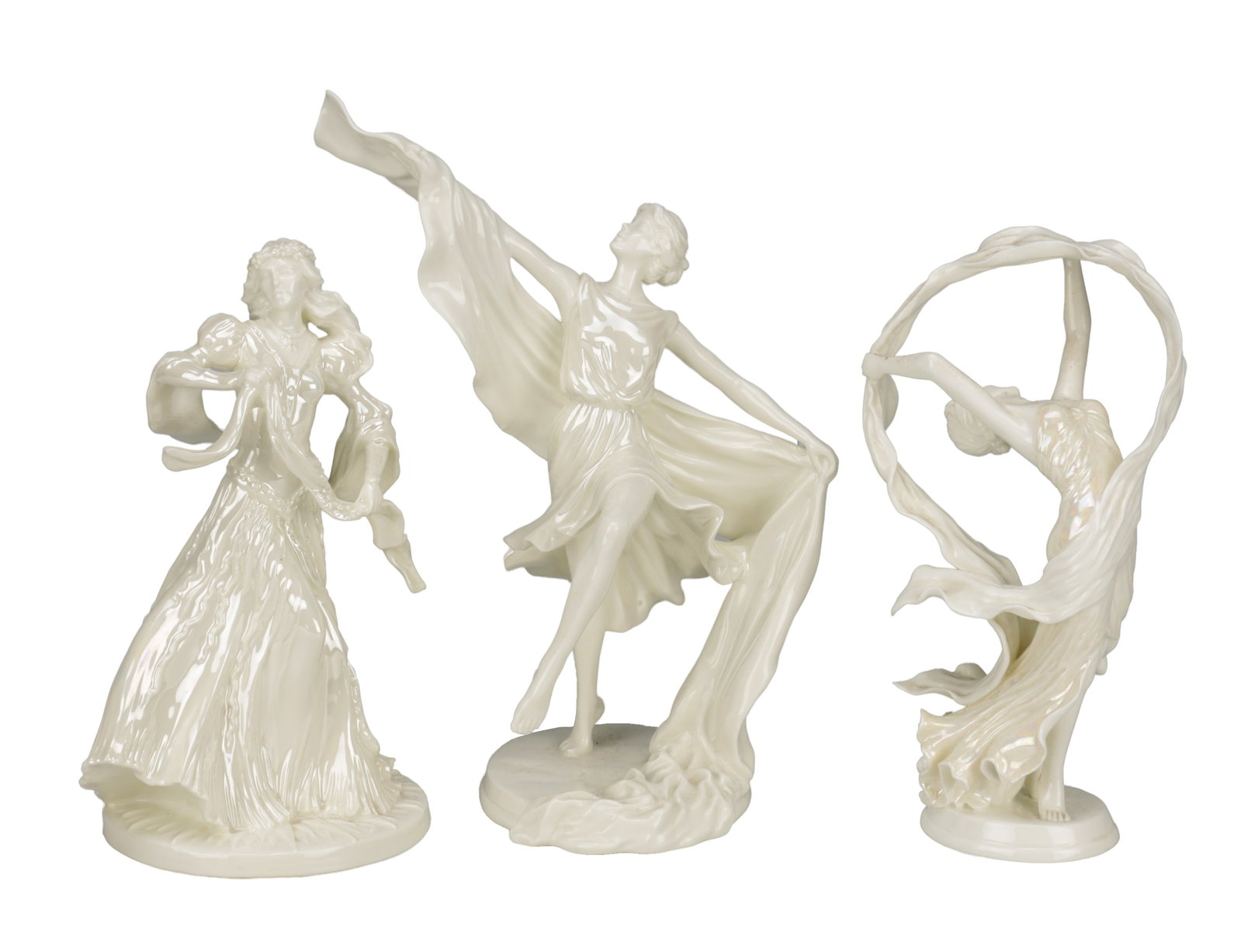 A COLLECTION OF THREE ROYAL WORCESTER PEARL LUSTRE FIGURES: A COLLECTION OF THREE ROYAL WORCESTER PEARL LUSTRE FIGURES comprising Spirit of the Dance, Spirit of the Millennium and Summer Solstice, each modelled as a draped dancer with flowing drapery in a pear