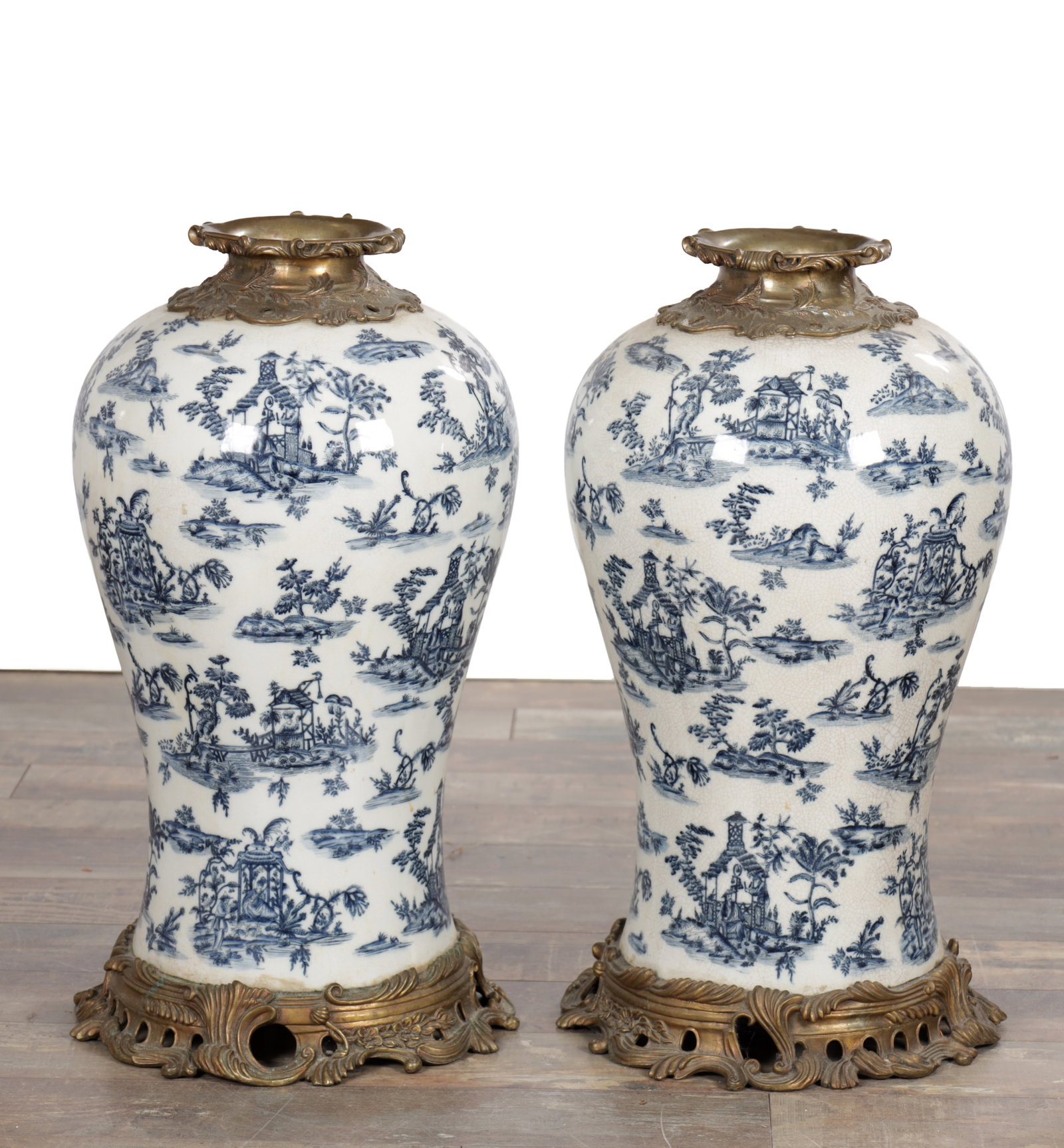 AN IMPRESSIVE PAIR OF LATE 19TH CENTURY FRENCH BLUE AND WHITE PORCELAIN AND ORMOLU MOUNTED VASES (1 of 10)