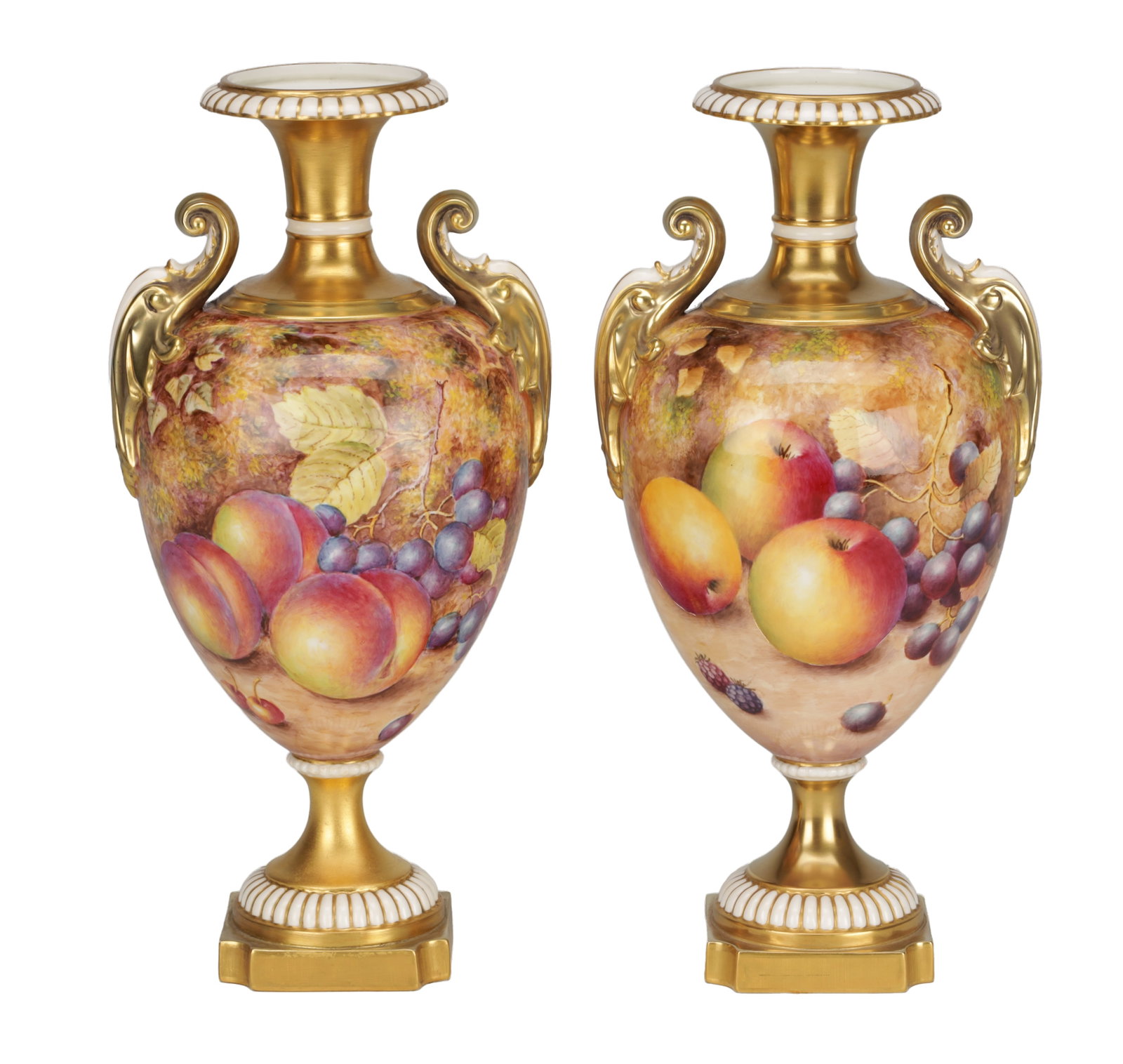 FREEMAN A PAIR OF 1969 ROYAL WORCESTER PORCELAIN FRUIT-PAINTED CABINET VASES: FREEMAN A PAIR OF 1969 ROYAL WORCESTER PORCELAIN FRUIT-PAINTED CABINET VASES each of classical urn form with gilt twin scroll handles, everted gadrooned rims and square plinth bases, painted with appl