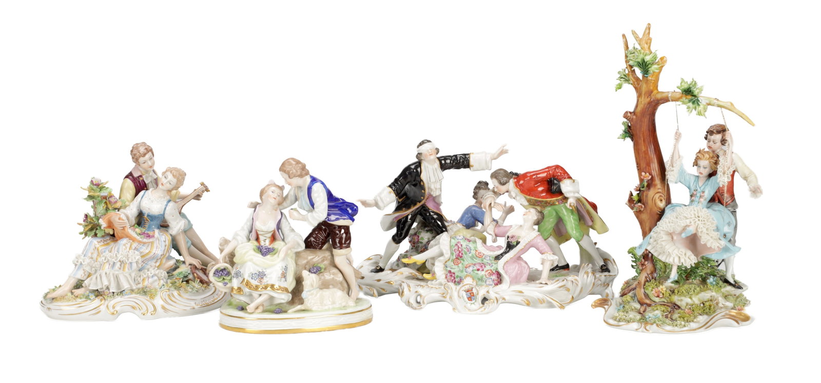 A COLLECTION OF FOUR CONTINENTAL PORCELAIN FIGURE GROUPS: A COLLECTION OF FOUR CONTINENTAL PORCELAIN FIGURE GROUPS polychrome decorated and gilt, each modelled as 18th century gallants and companions on scroll moulded bases, comprising a couple on a swing be