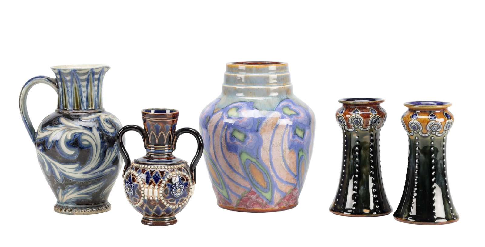 A MIXED LOT OF 19TH/20TH CENTURY ROYAL DOULTON AND DOULTON LAMBETH CERAMICS: A MIXED LOT OF 19TH/20TH CENTURY ROYAL DOULTON AND DOULTON LAMBETH CERAMICS comprising a Royal Doulton ovoid vase with mottled blue and purple glaze; a Doulton Lambeth jug with incised scroll decorati