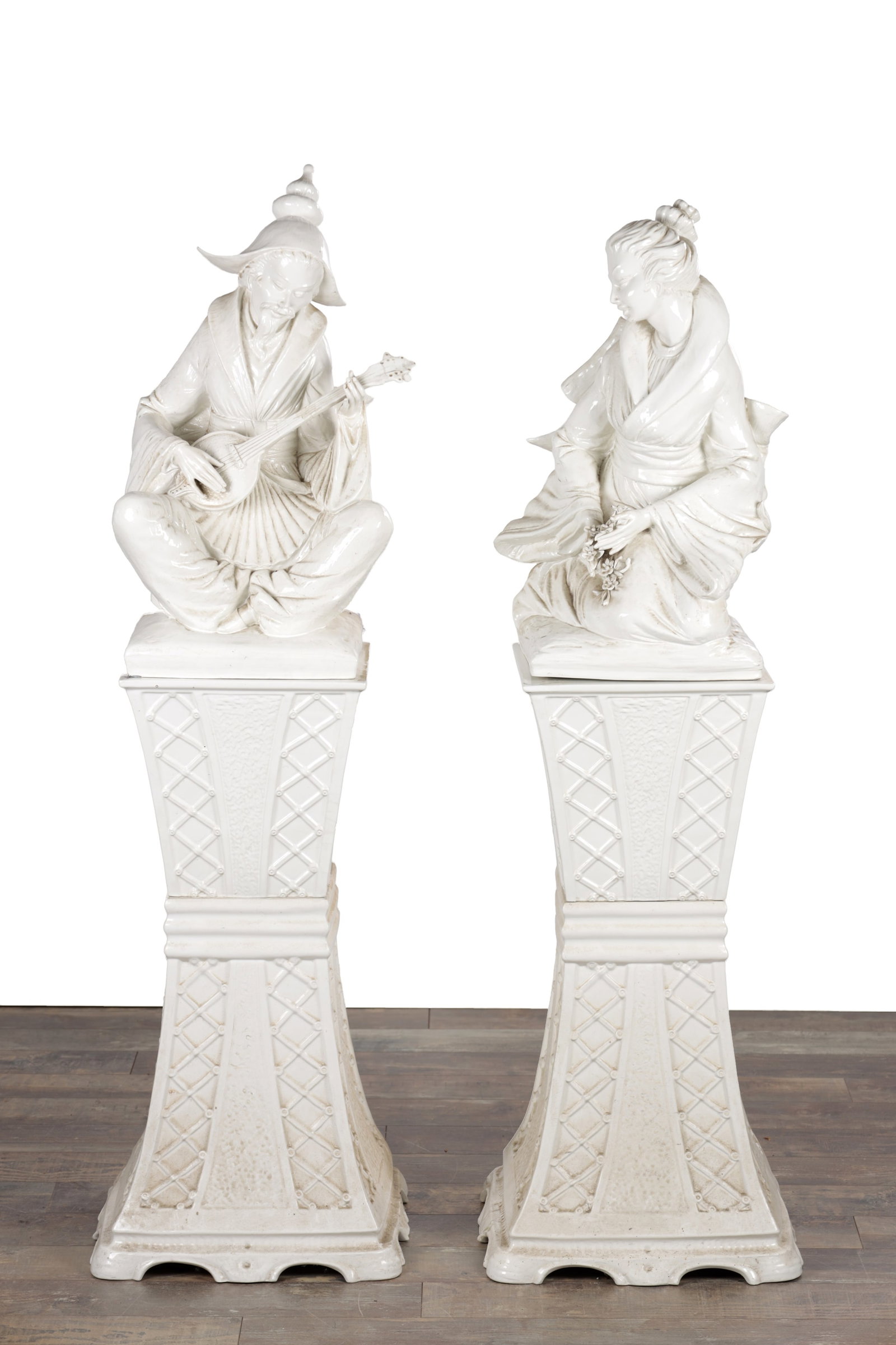 A LARGE PAIR OF BLANC DE CHINE CHINESE STYLE PORCELAIN FIGURES ON PEDESTALS (1 of 10)