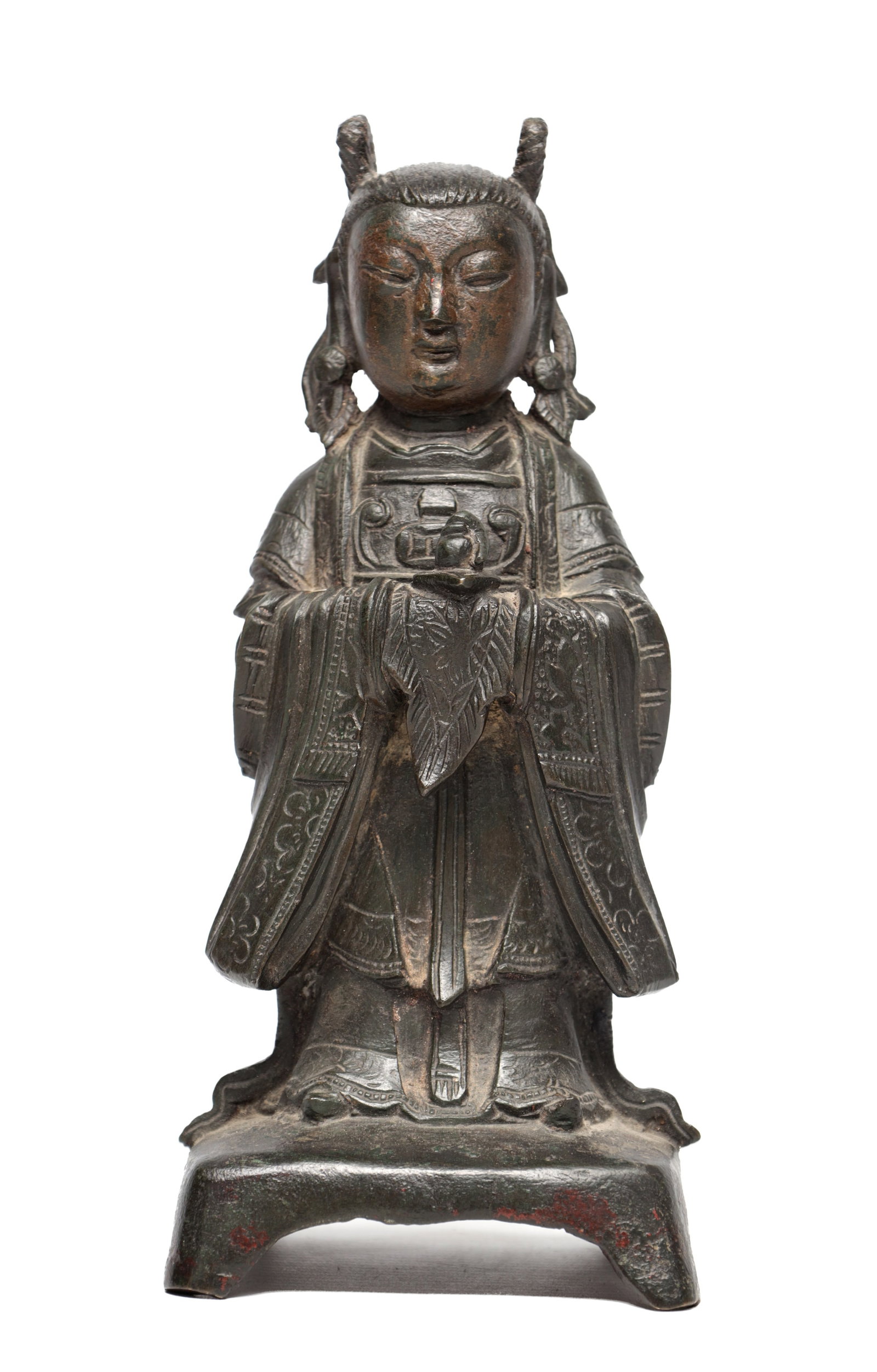 AN EARLY CHINESE BRONZE FIGURE OF AN IMMORTAL: AN EARLY CHINESE BRONZE FIGURE OF AN IMMORTAL standing robed and holding a small offering on a tray, the hair arranged in twin topknots, a patinated bronze with a dark brown patina on an integral