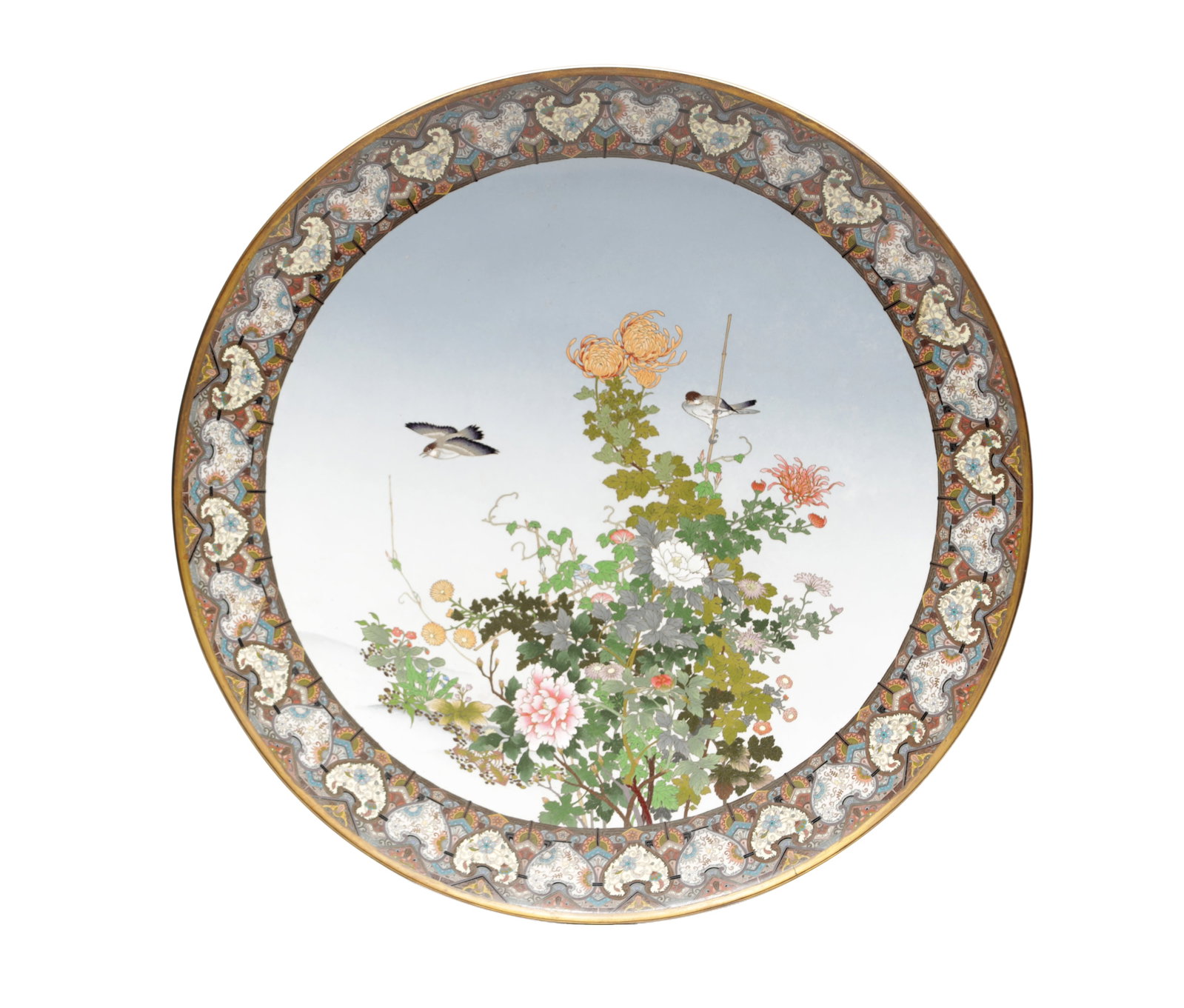 A MEIJI PERIOD JAPANESE CLOISONNE ENAMEL CHARGER: A MEIJI PERIOD JAPANESE CLOISONNE ENAMEL CHARGER of circular form finely worked with birds among chrysanthemums and other seasonal blooms on a graduated pale blue ground, within a wide polychrome