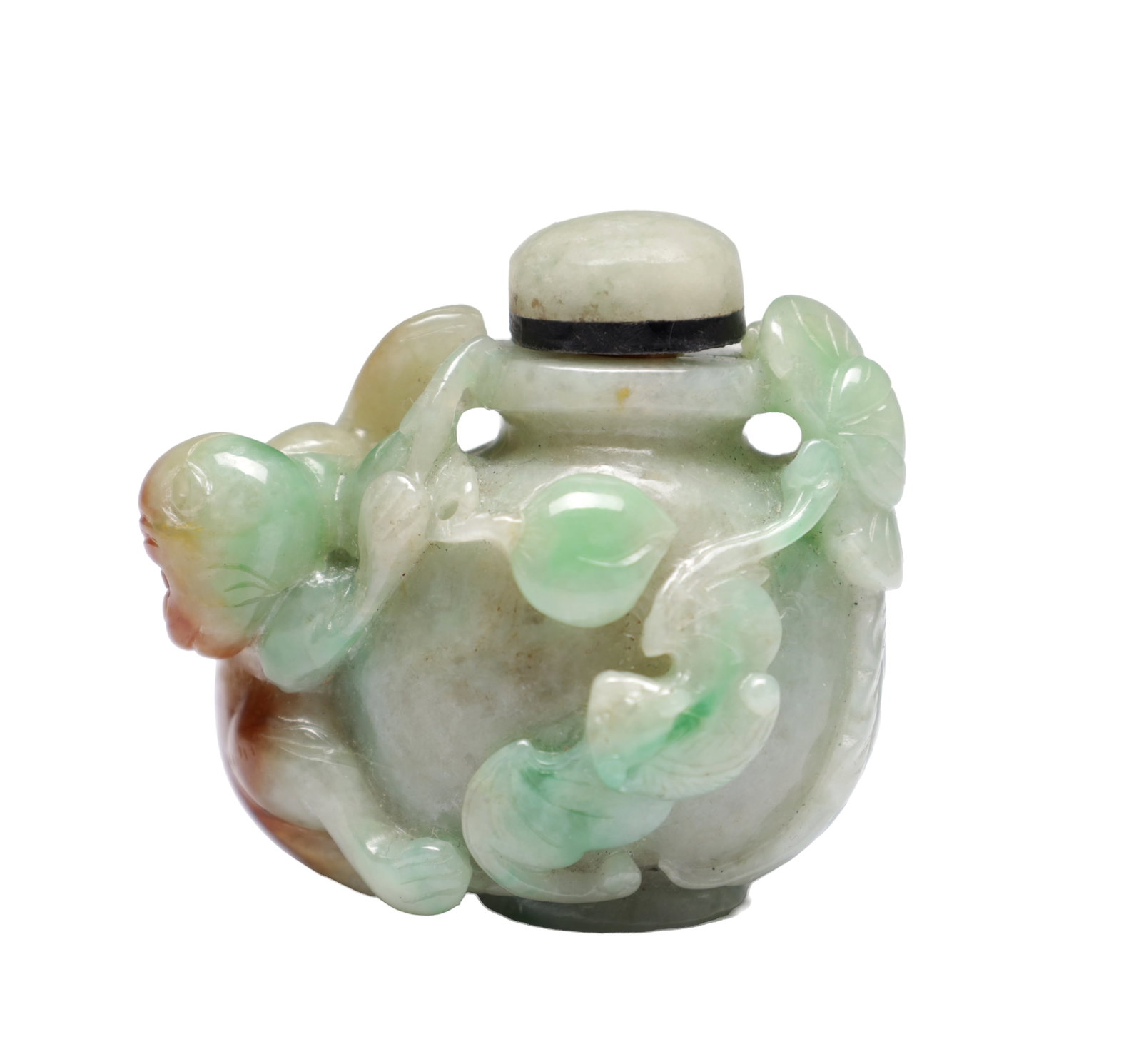 A CHINESE CARVED RUSSET AND GREEN JADE SNUFF BOTTLE WITH MONKEY: A CHINESE CARVED RUSSET AND GREEN JADE SNUFF BOTTLE WITH MONKEY of rounded shouldered form with a relief-carved monkey clambering among leafy branches, the shoulders pierced for cords, fitted with a