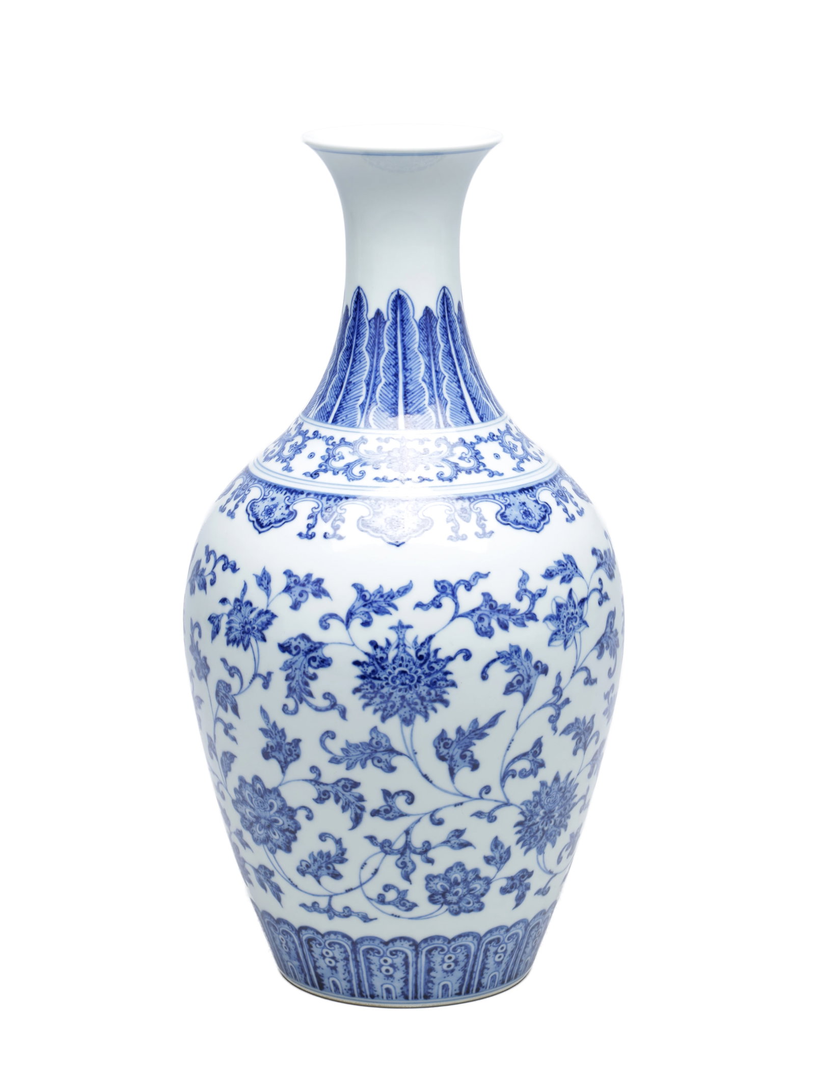 A CHINESE BLUE AND WHITE PORCELAIN VASE: A CHINESE BLUE AND WHITE PORCELAIN VASE of ovoid baluster form with a flared trumpet neck, painted with scrolling floral sprays between ruyi and petal lappet borders with a Qianlong mark to the base. 