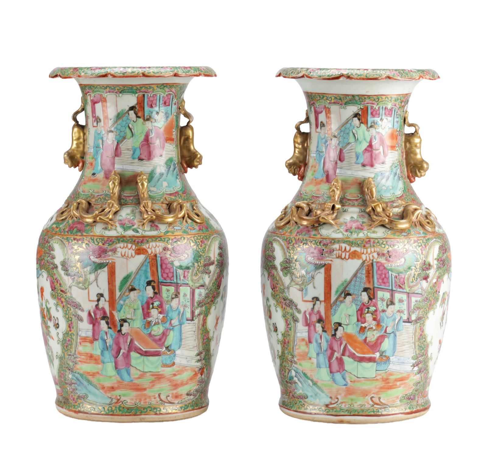 A PAIR OF LATE 19TH CENTURY CHINESE CANTON FAMILLE ROSE PORCELAIN VASES: A PAIR OF LATE 19TH CENTURY CHINESE CANTON FAMILLE ROSE PORCELAIN VASES of baluster form with flared rims, applied gilt chilong and mask handles to the neck and shoulder, enamelled with panelled court