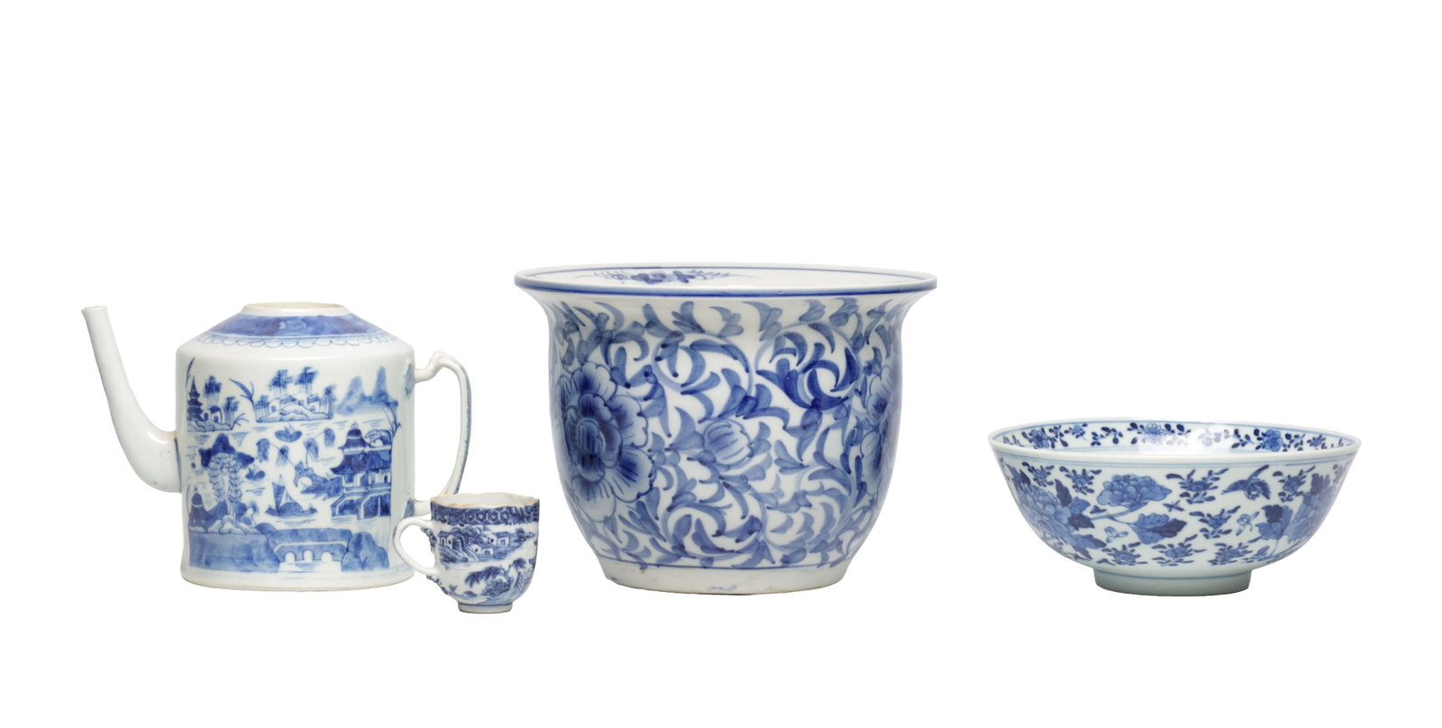 FOUR PIECES OF CHINESE BLUE AND WHITE PORCELAIN: FOUR PIECES OF CHINESE BLUE AND WHITE PORCELAIN comprising an 18th century cylindrical teapot painted with a river landscape, a small cup, a jardiniere with flared rim and peony scroll, and a circular