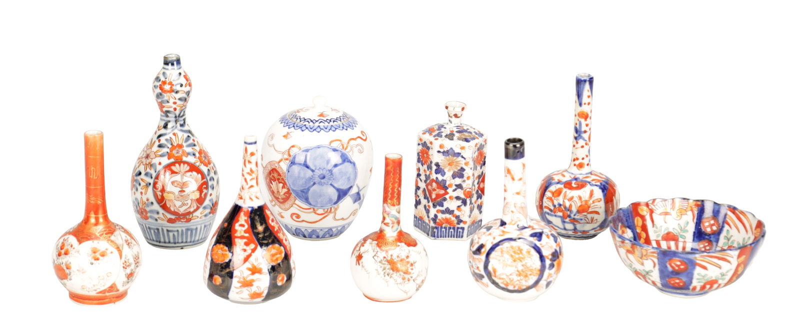 A COLLECTION OF NINE PIECES OF JAPANESE PORCELAIN: A COLLECTION OF NINE PIECES OF JAPANESE PORCELAIN comprising five Imari vases, an Imari bowl, an Imari jar and cover, and two Kutani vases. (tallest vase 17.5cm high)