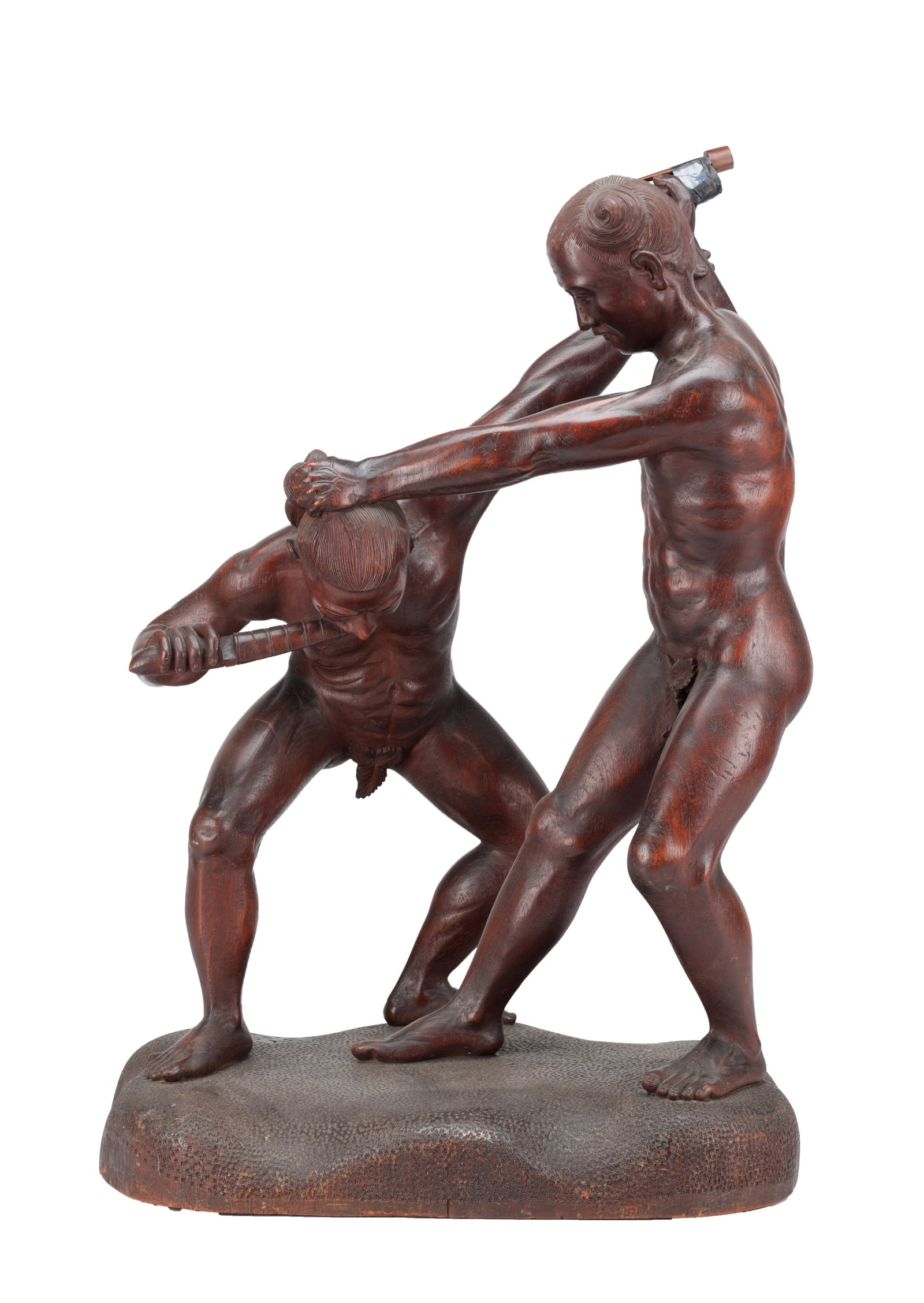A MEIJI PERIOD JAPANESE CARVED HARDWOOD SCULPTURE OF TWO WRESTLERS: A MEIJI PERIOD JAPANESE CARVED HARDWOOD SCULPTURE OF TWO WRESTLERS naturalistically carved as two nude combatants grappling on a textured oval base, signed "Sayasan". (75cm high)