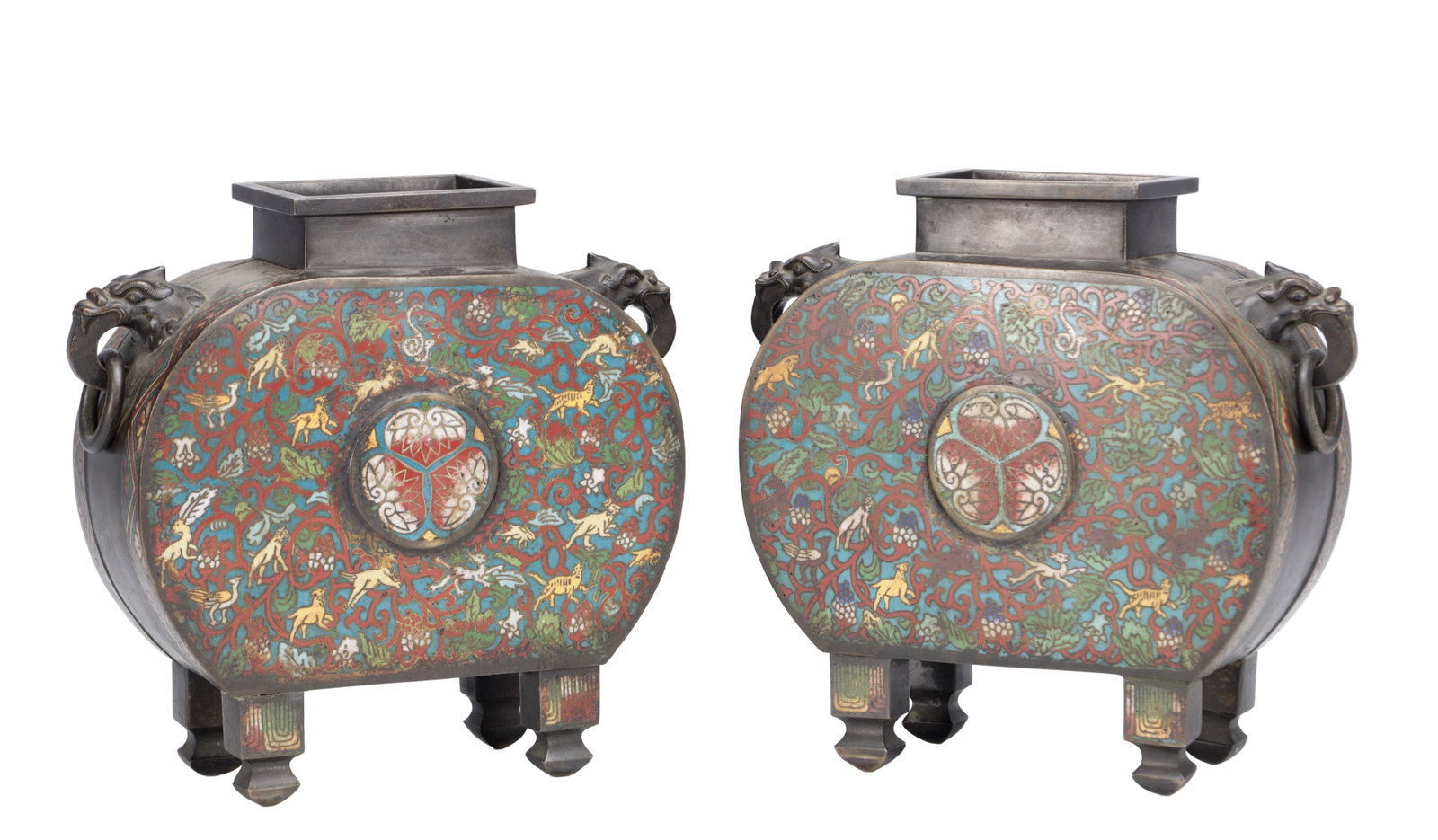 A PAIR OF 19TH CENTURY CHINESE CLOISONNE ENAMEL BRONZE VASES: A PAIR OF 19TH CENTURY CHINESE CLOISONNE ENAMEL BRONZE VASES of flattened moonflask form with square necks, twin dragon mask ring handles and standing on four bracket feet, each side decorated with a 