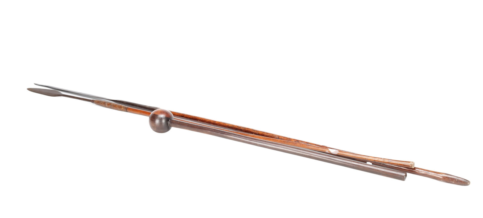 A COLLECTION OF AFRICAN WEAPONS: A COLLECTION OF AFRICAN WEAPONS comprising two iron-bladed spears with wooden shafts and a hardwood ball-headed knobkerrie. (157cm long, 139cm long and 72cm long)
