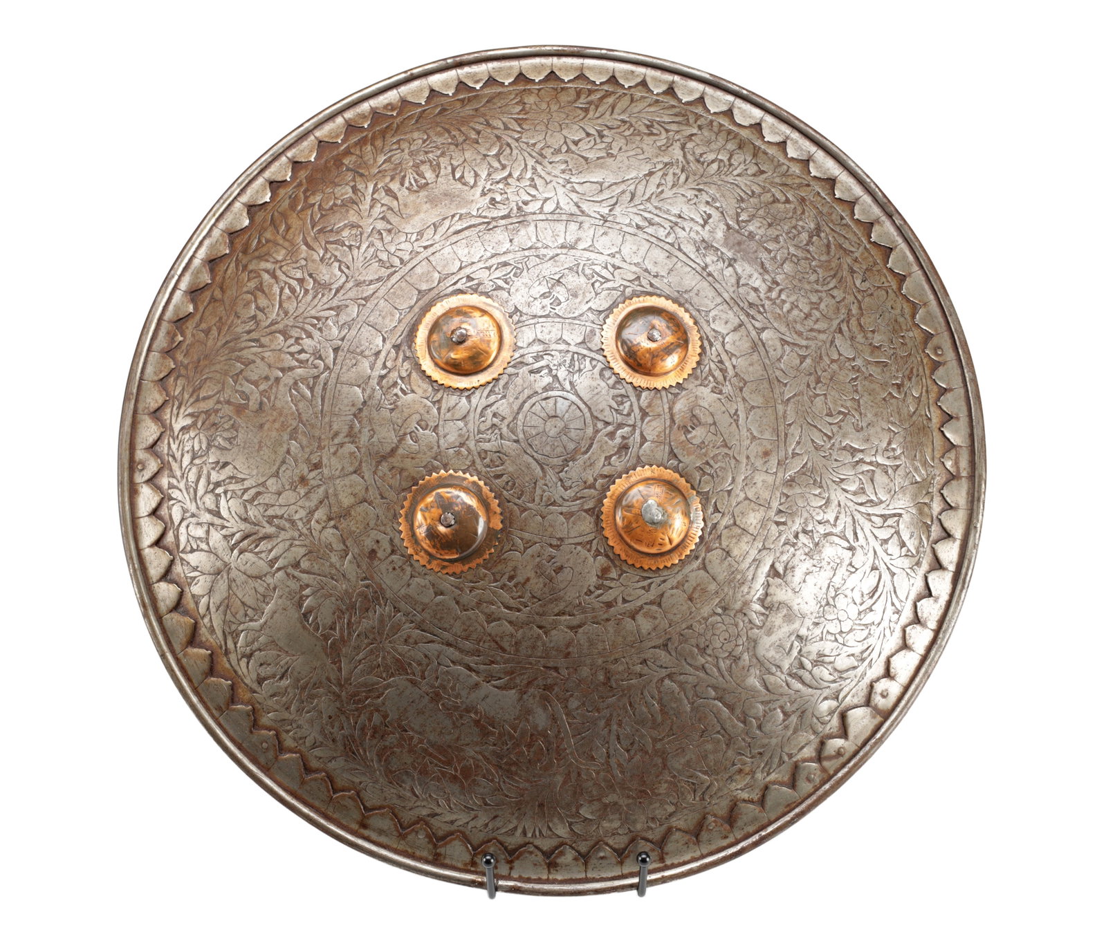 A MUGHAL EMPIRE STEEL DHAL SHIELD WITH FOUR COPPER BOSSES (1 of 9)