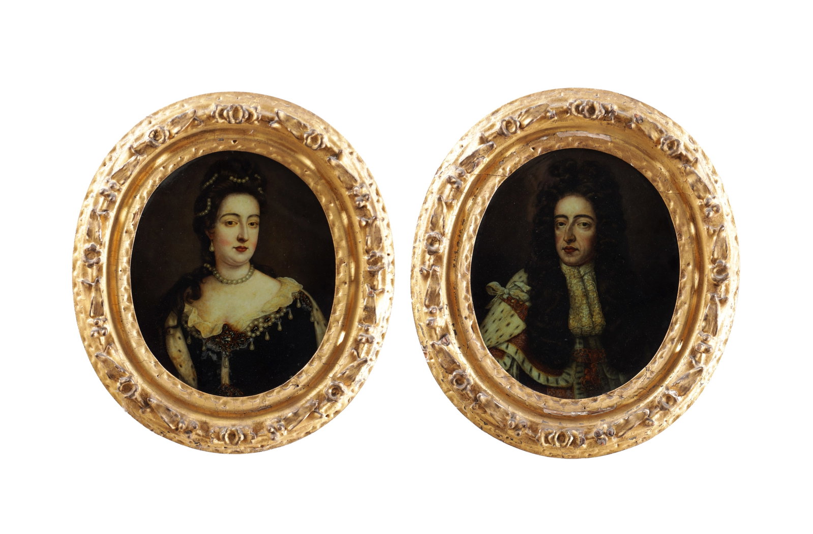 A PAIR OF 18TH CENTURY REVERSE PAINTED ON GLASS PORTRAITS: A PAIR OF 18TH CENTURY REVERSE PAINTED ON GLASS PORTRAITS depicting half-length sitters on dark grounds and mounted in period carved gilt oval frames. (43cm high overall )