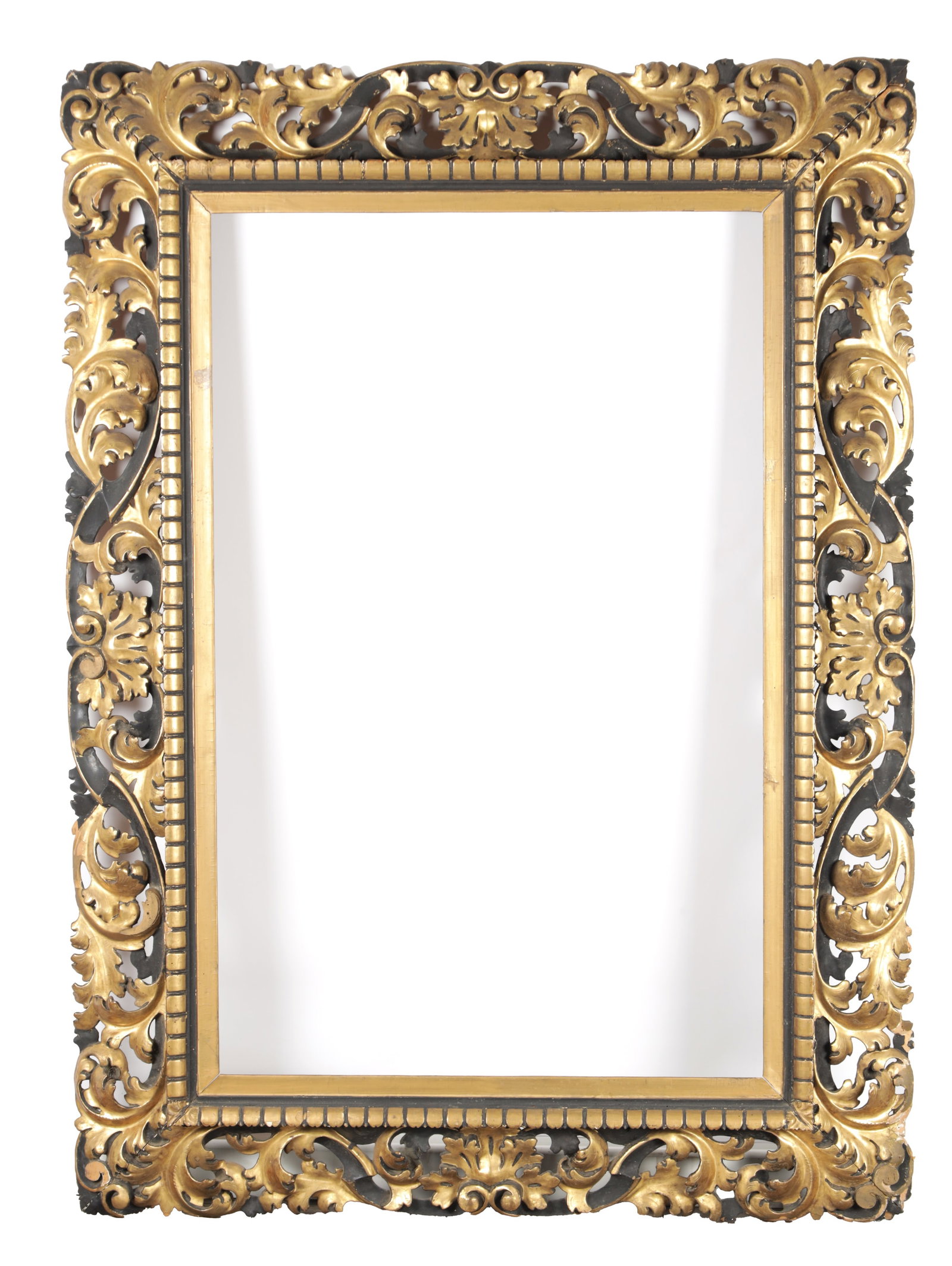 A 19TH CENTURY FLORENTINE CARVED GILTWOOD FRAME: A 19TH CENTURY FLORENTINE CARVED GILTWOOD FRAME of rectangular form with pierced scrolling acanthus on a black ground, with an inner moulded fillet and beaded sight edge. (99cm high overall, 137cm wid