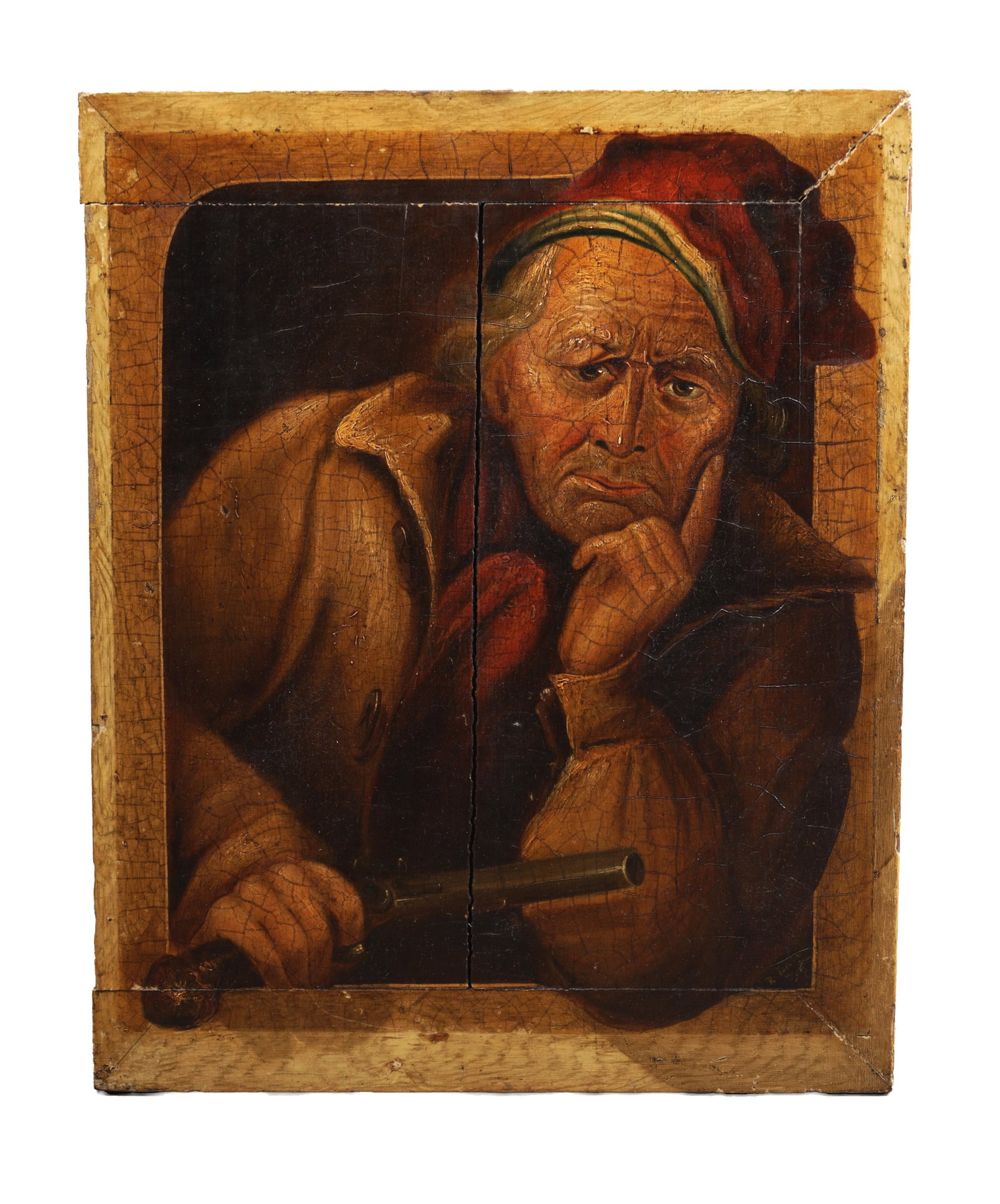 A 19TH CENTURY OIL ON PANEL PORTRAIT OF A SMUGGLER: A 19TH CENTURY OIL ON PANEL PORTRAIT OF A SMUGGLER depicting a half-length figure within a feigned arched surround, resting on a ledge and holding a pistol, bearing an artist label for Richard Jones,