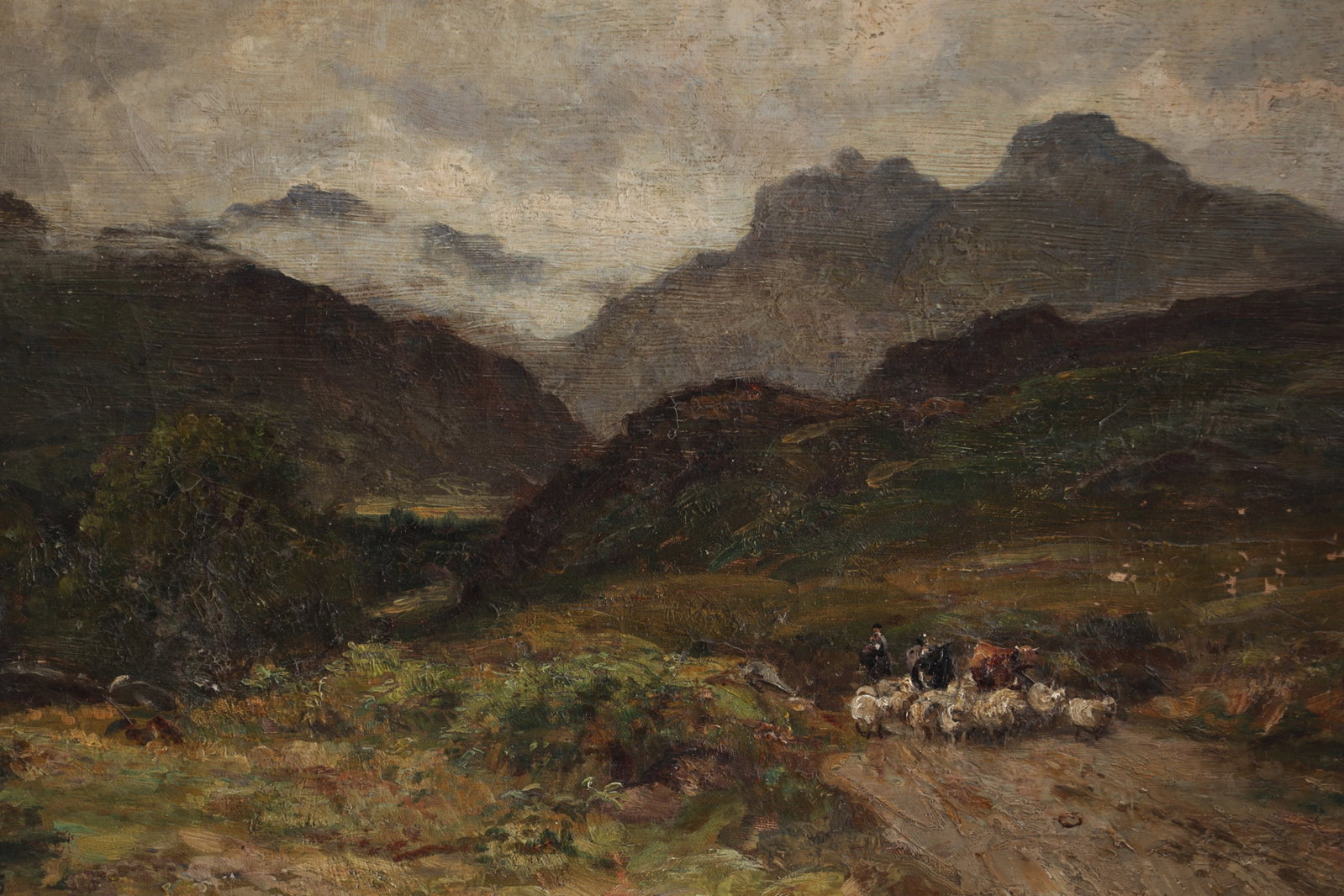 R G SOMERSET AN EARLY 20TH CENTURY OIL ON CANVAS LANDSCAPE LANGDALE PIKES: R G SOMERSET AN EARLY 20TH CENTURY OIL ON CANVAS LANDSCAPE LANGDALE PIKES signed and dated 1905, inscribed on the reverse "Langdale Pikes", depicting a mountainous Lake District view with drovers and
