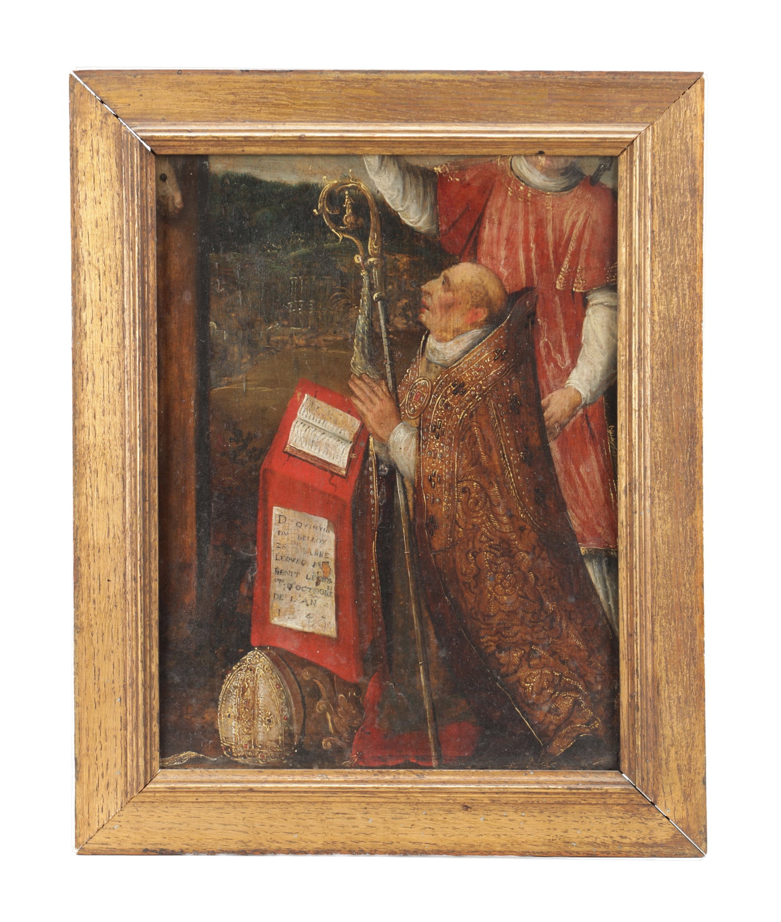 A 16TH CENTURY ENGLISH OIL ON PANEL FRAGMENT DATED 1543: A 16TH CENTURY ENGLISH OIL ON PANEL FRAGMENT DATED 1543 depicting a kneeling prelate in ornate gold embroidered vestments before a red-draped lectern with open book, holding a crozier, a jewelled