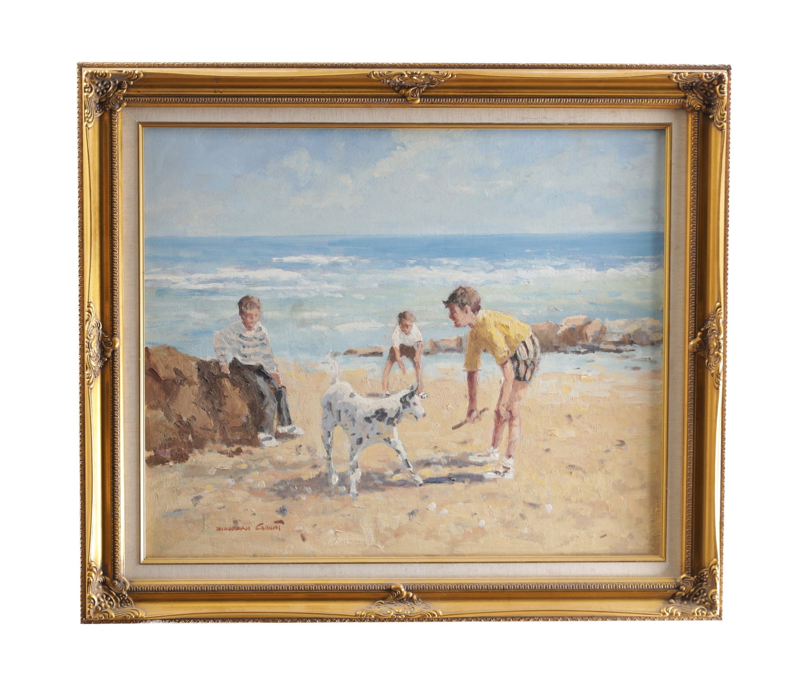 WILLIAM NORMAN GAUNT (BRITISH 1918-2001) AN OIL ON CANVAS: WILLIAM NORMAN GAUNT (BRITISH 1918-2001) AN OIL ON CANVAS depicting children playing on a beach with a Dalmatian before the surf, signed lower left, mounted in a carved, gilt frame. (49cm high, 60cm