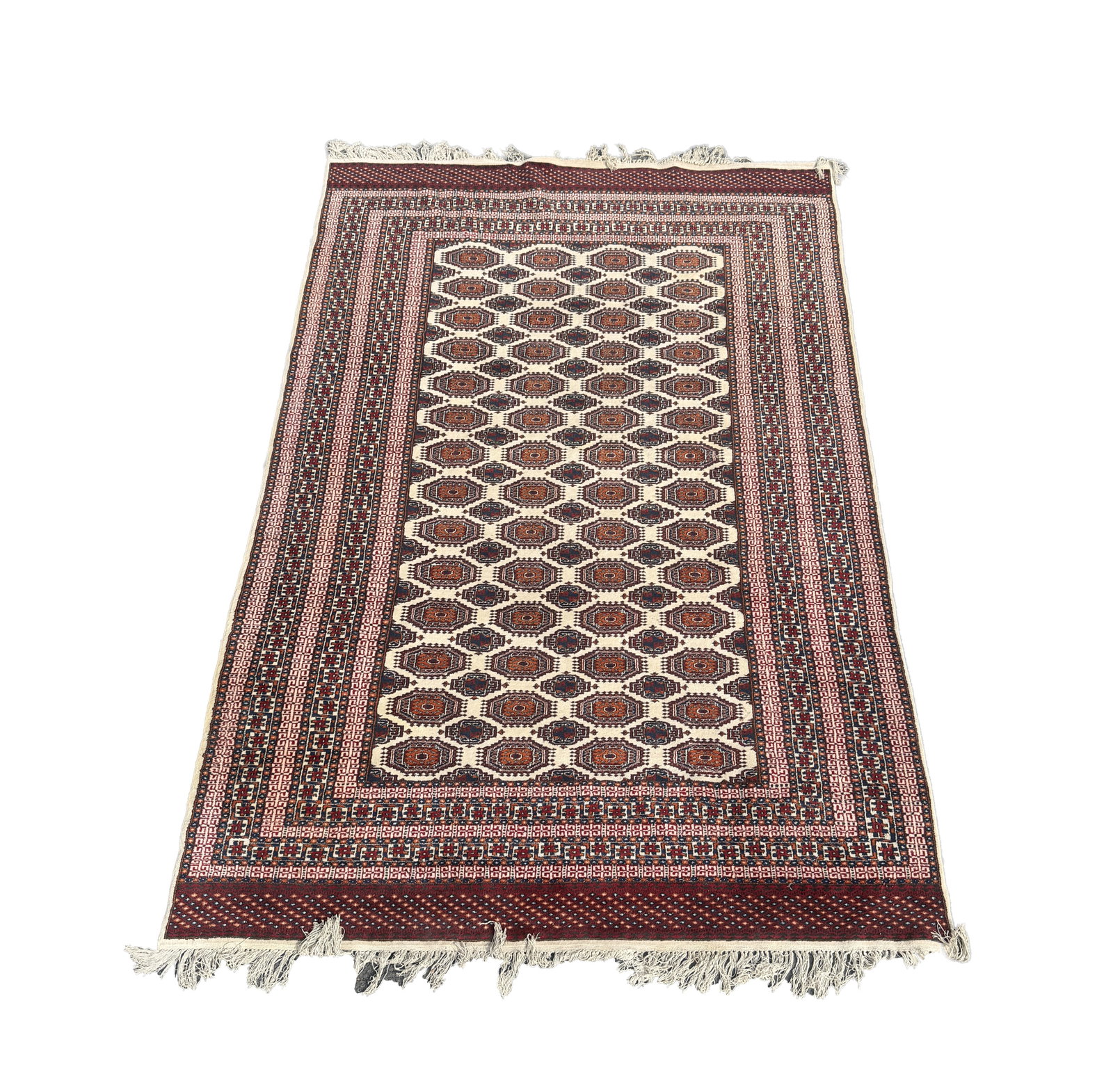A BOKHARA WOOL CARPET: A BOKHARA WOOL CARPET with repeating rows of octagonal guls on a dark ground within multiple guard borders and a broad main border, fringed to both ends. (270cm long, 185cm wide)