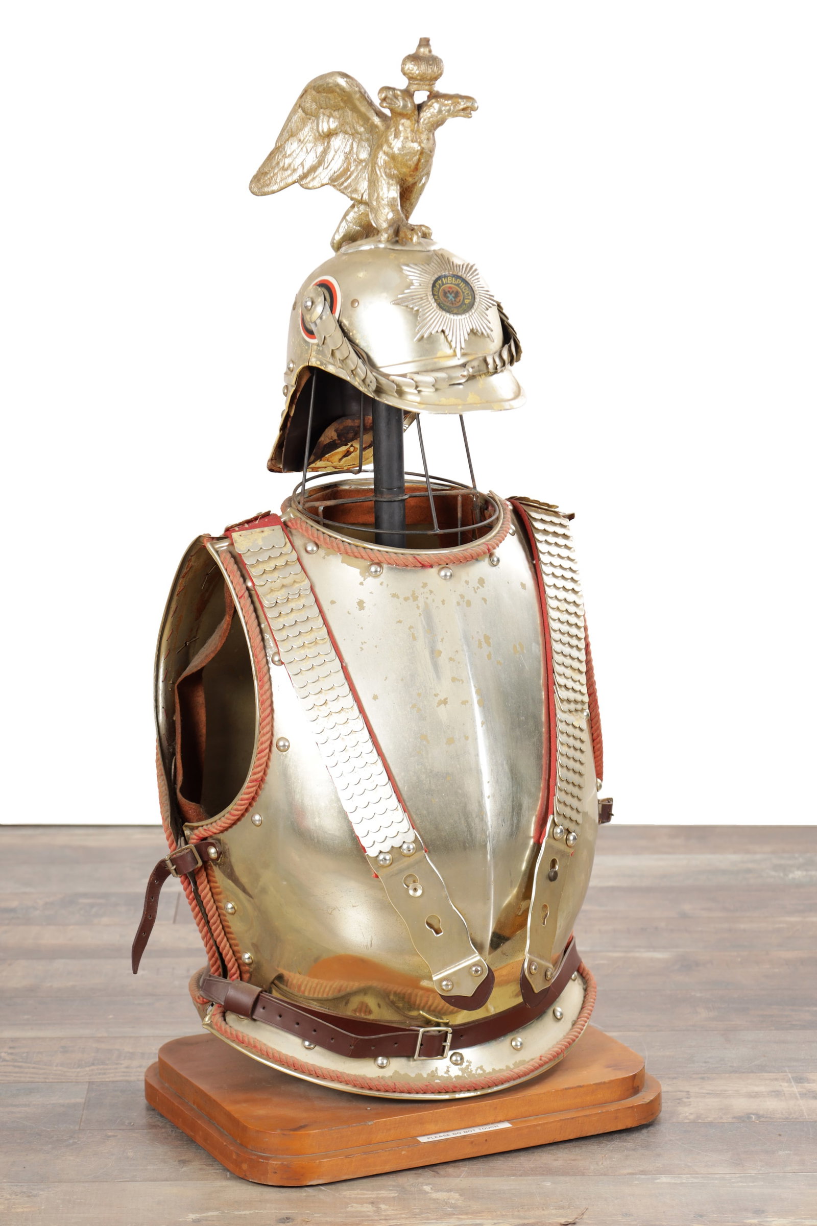 A BBC PROP MODELLED AS A REGIMENTAL HELMET, BREAST AND BACKPLATE (1 of 6)