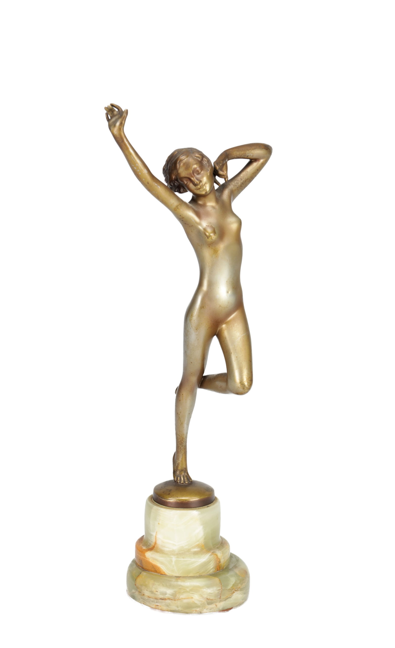 JOSEF LORENZL AN ART DECO GILT BRONZE FIGURE OF A DANCING NUDE ON ONYX BASE: JOSEF LORENZL AN ART DECO GILT BRONZE FIGURE OF A DANCING NUDE ON ONYX BASE modelled as a slender nude poised on one foot with raised arm and tilted head, the circular stepped base in pale green onyx.