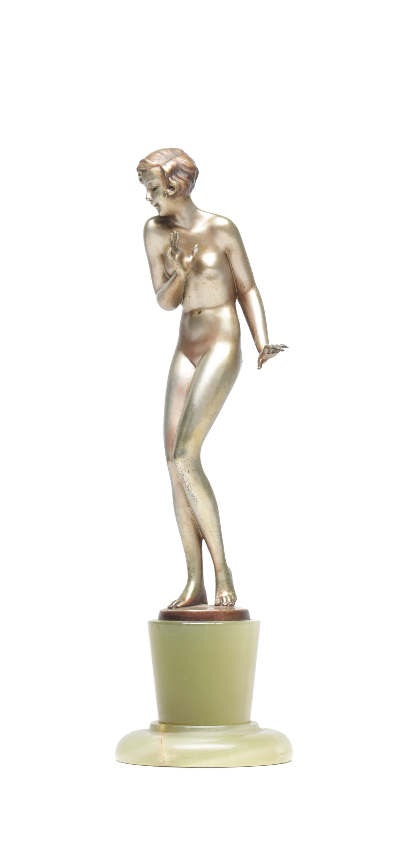 JOSEF LORENZL AN ART DECO AUSTRIAN COLD-PAINTED BRONZE FIGURE OF A SEMI-NUDE FEMALE ON ONYX BASE: JOSEF LORENZL AN ART DECO AUSTRIAN COLD-PAINTED BRONZE FIGURE OF A SEMI-NUDE FEMALE ON ONYX BASE standing with one hand raised and the other extended on a circular green onyx socle, the bronze cast "R