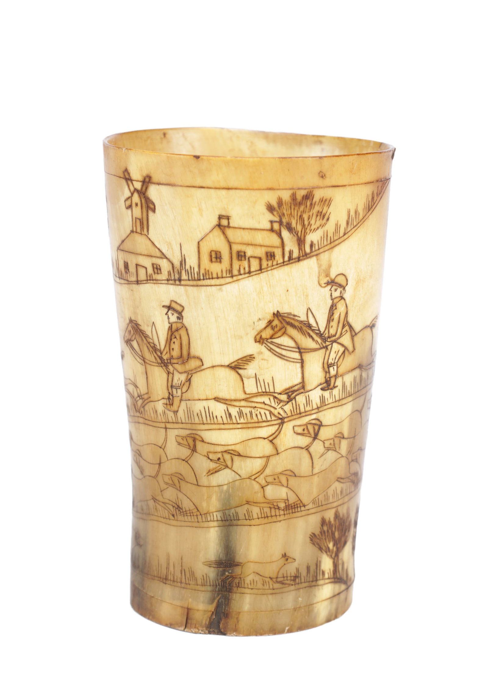 A LATE 19TH CENTURY STAGHORN CUP: A LATE 19TH CENTURY STAGHORN CUP of tapering cylindrical form engraved with a continuous hunting scene of mounted huntsmen and hounds with cottages and a windmill. (12.5cm high)